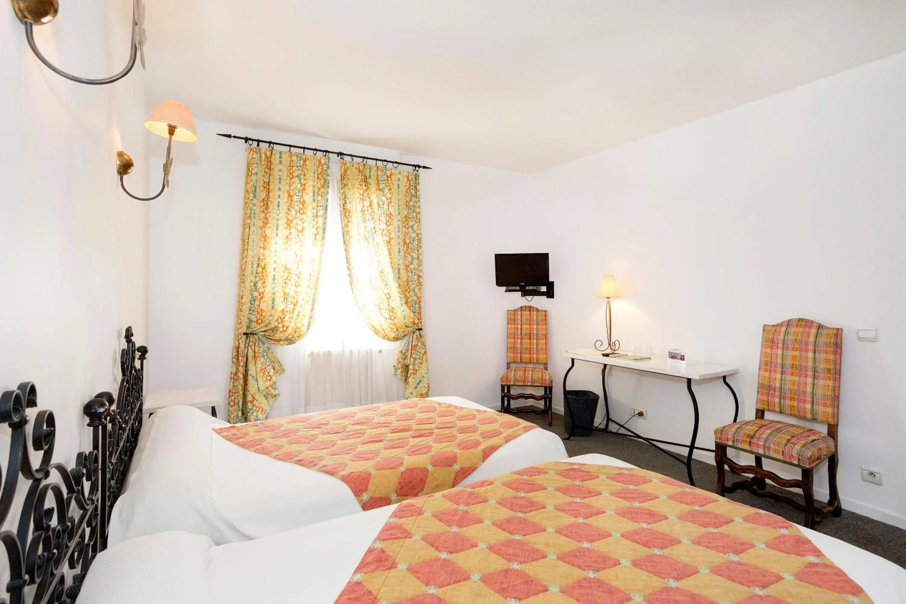 Bedroom, Bed in Logis Hôtels - Hôtel Restaurant du Midi