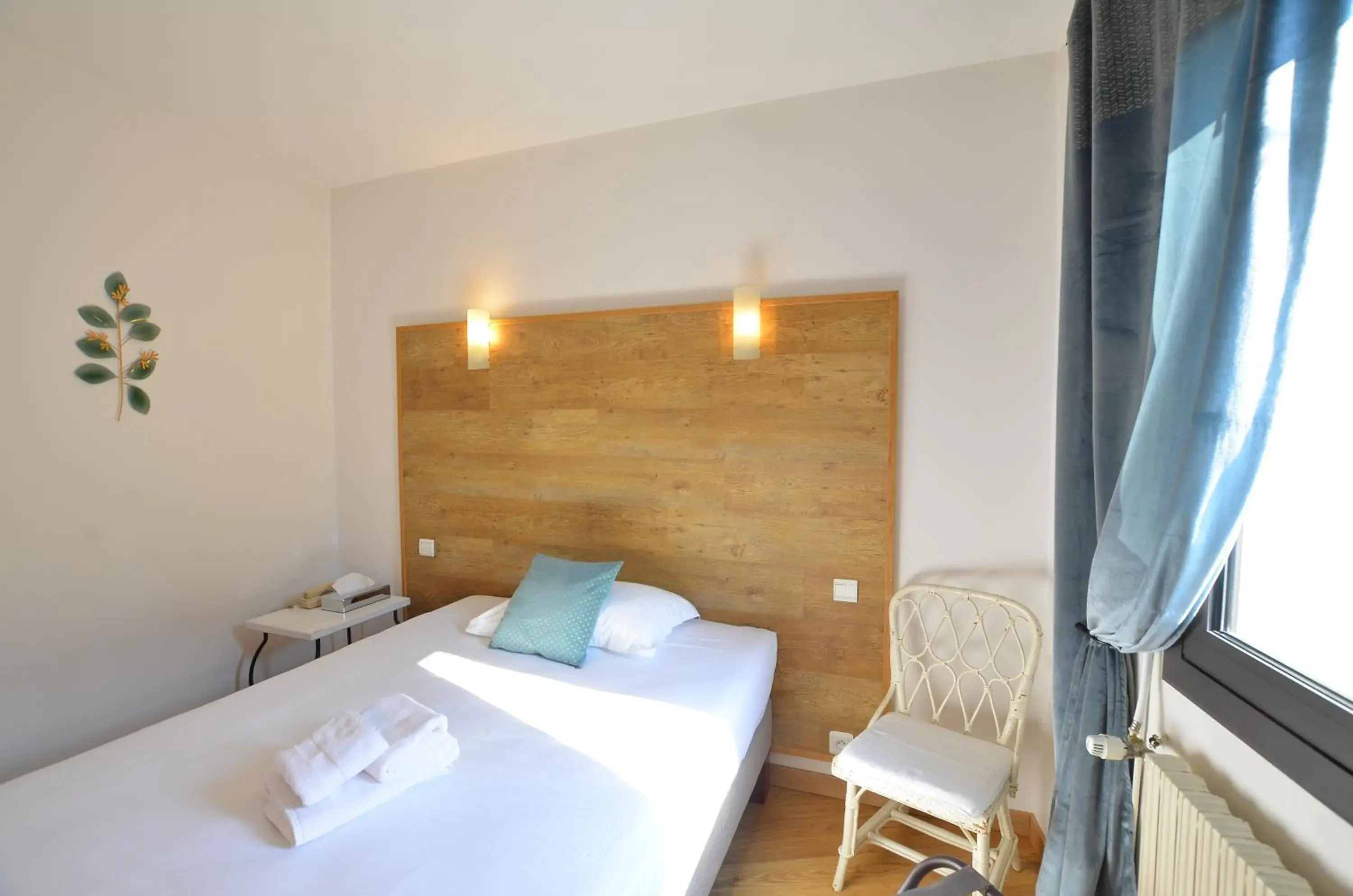 Bedroom, Bed in Logis Hôtels - Hôtel Restaurant du Midi Bedroom, Bed in Logis Hôtels - Hôtel Restaurant du Midi