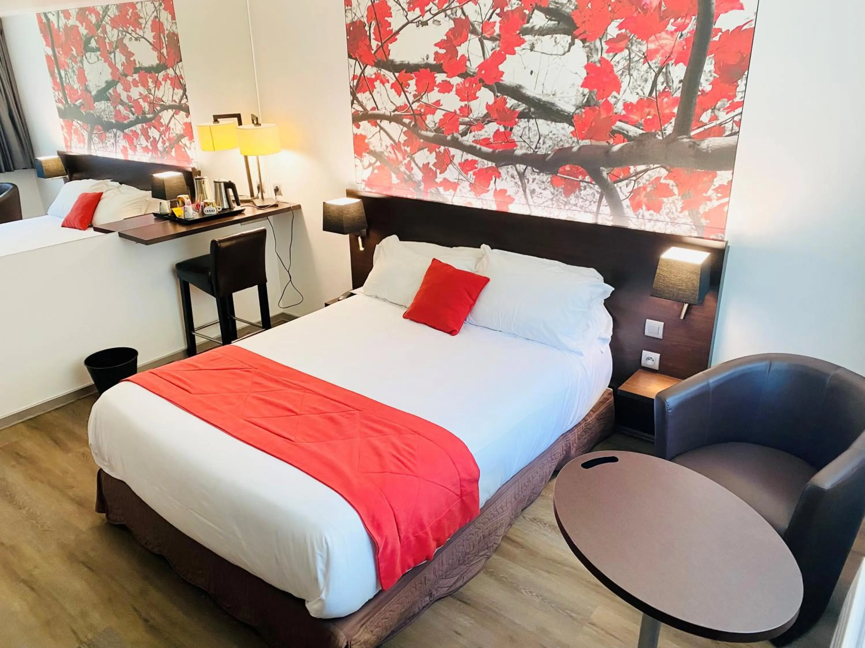 Bed in Hotel Pavillon des Gatines