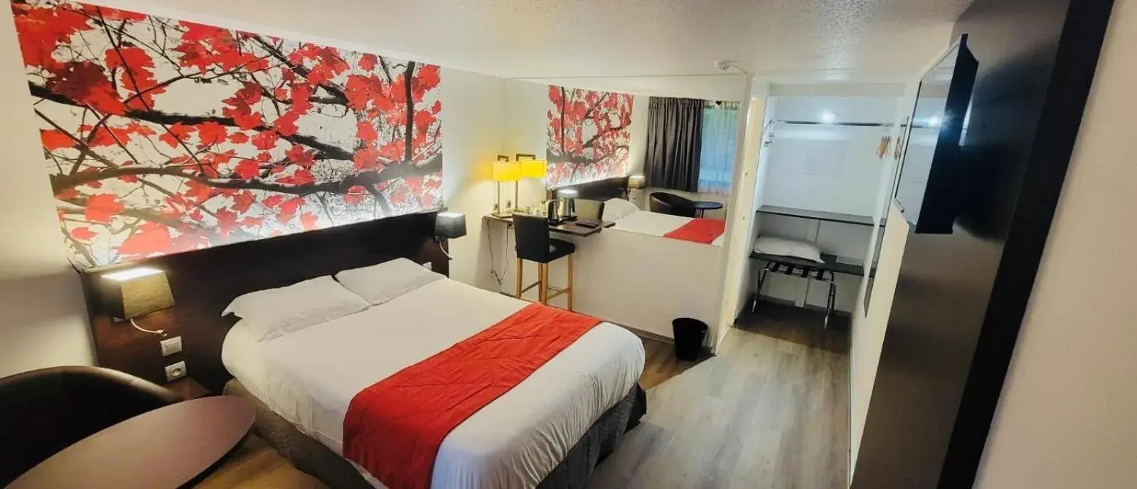 Bed in Hotel Pavillon des Gatines Bed in Hotel Pavillon des Gatines