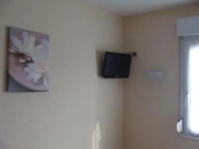 TV/Entertainment Center in Ashley Hotel Le Mans Sud