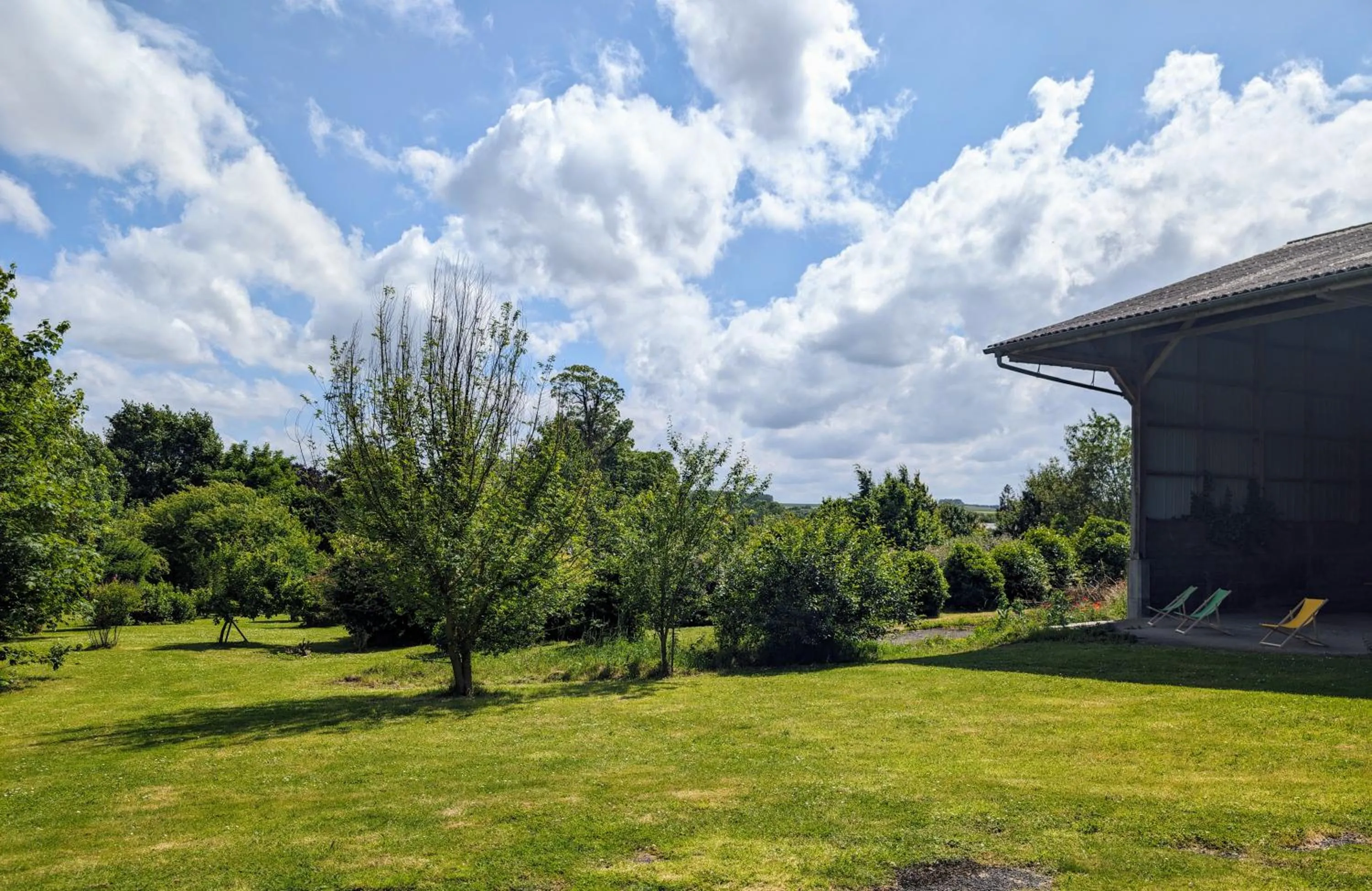 Garden in Le Relais du Beffroi & SPA