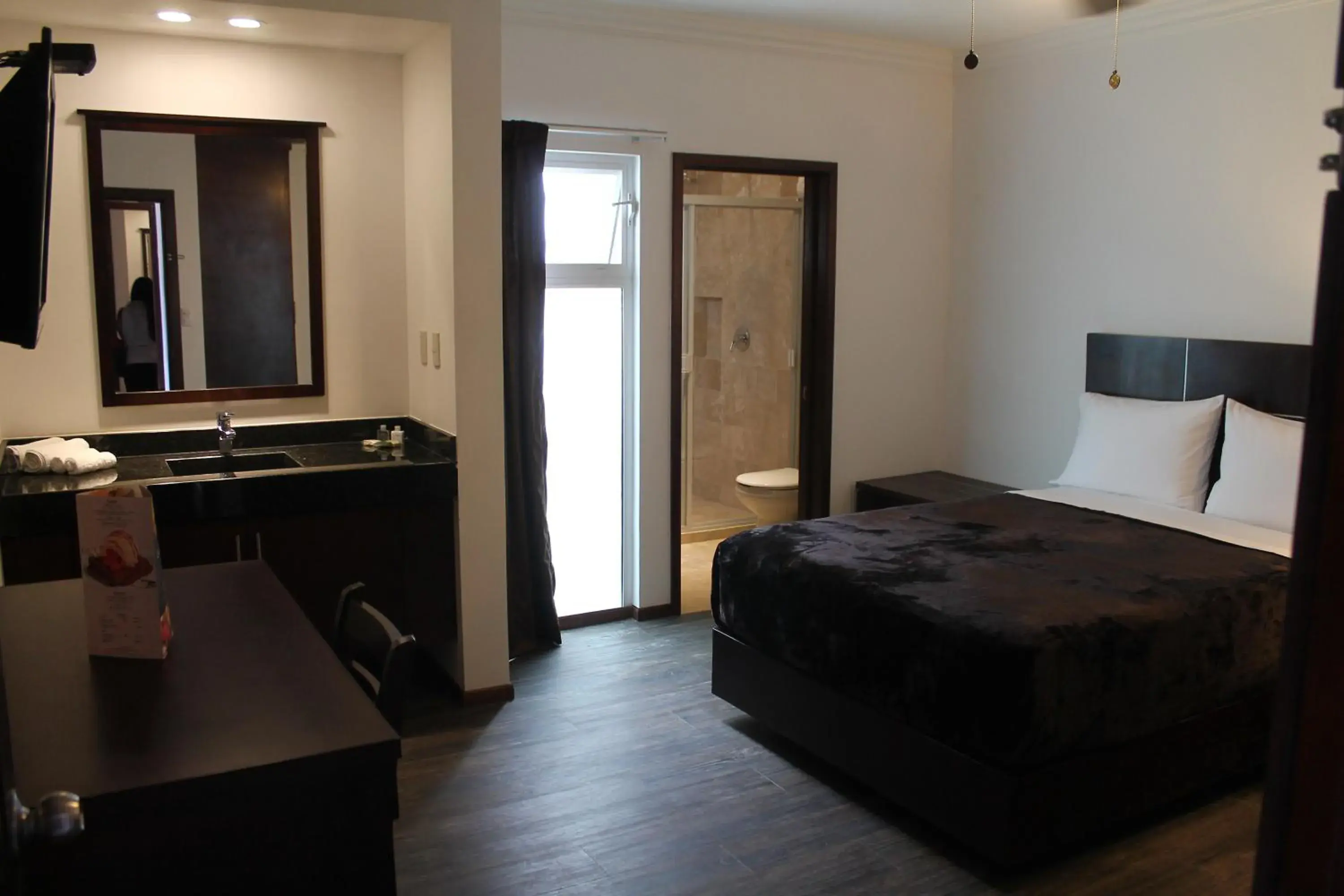 Bed in Hotel Rincon Real Suites Bed in Hotel Rincon Real Suites