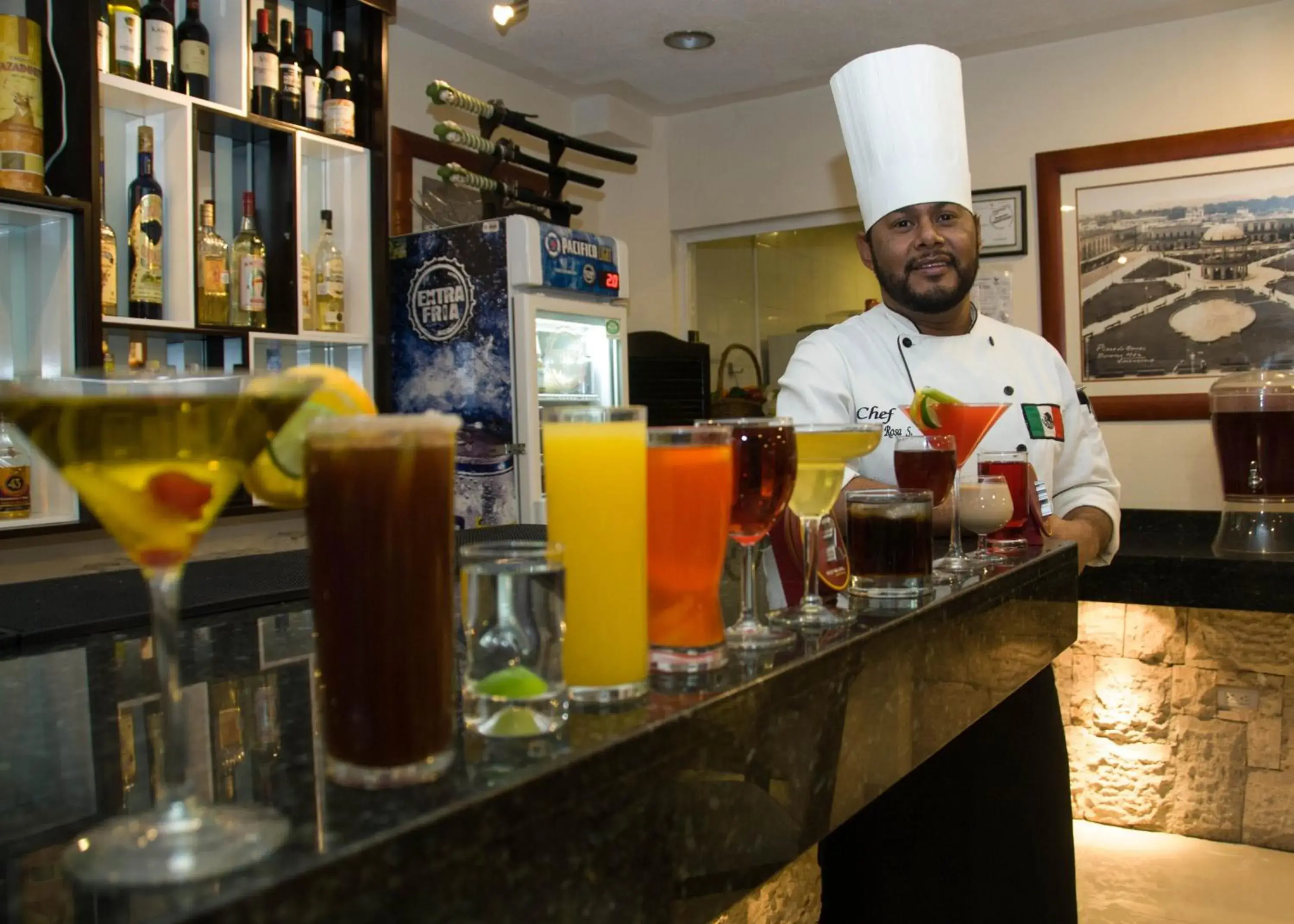 Lounge or bar in Hotel Rincon Real Suites Lounge or bar in Hotel Rincon Real Suites