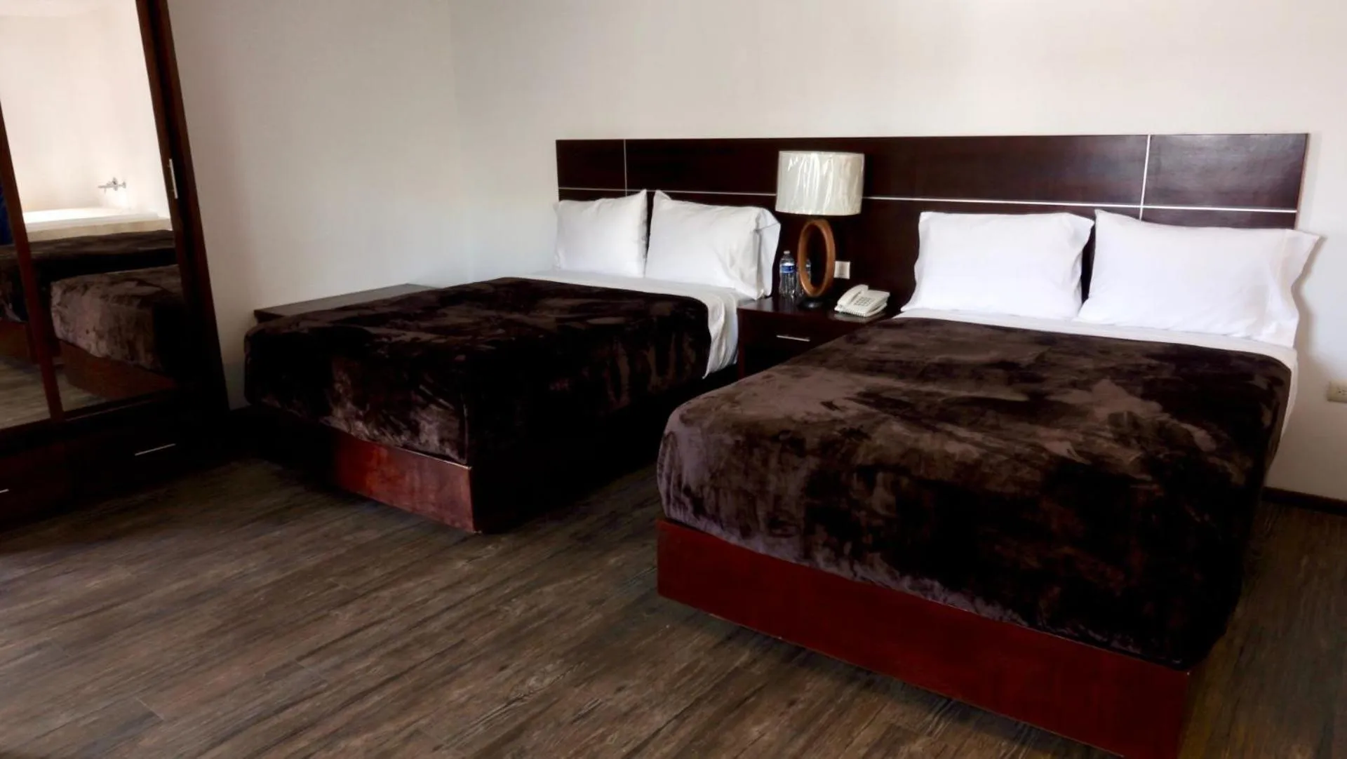 Bedroom in Hotel Rincon Real Suites