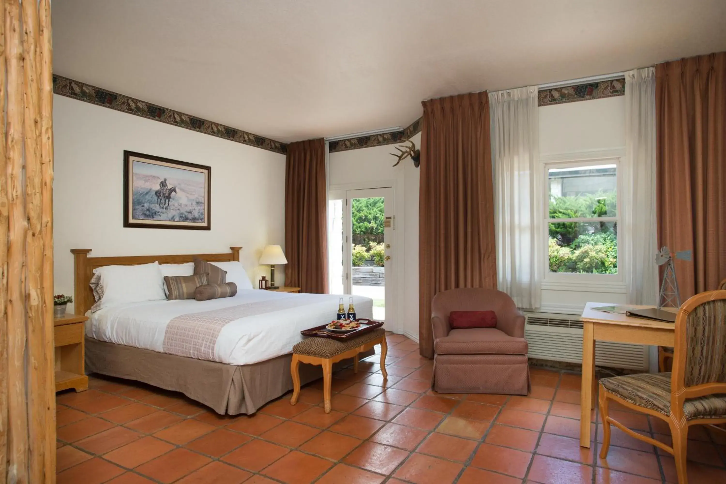 Seating area, Bed in Y O Ranch Hotel and Conference Center Seating area, Bed in Y O Ranch Hotel and Conference Center