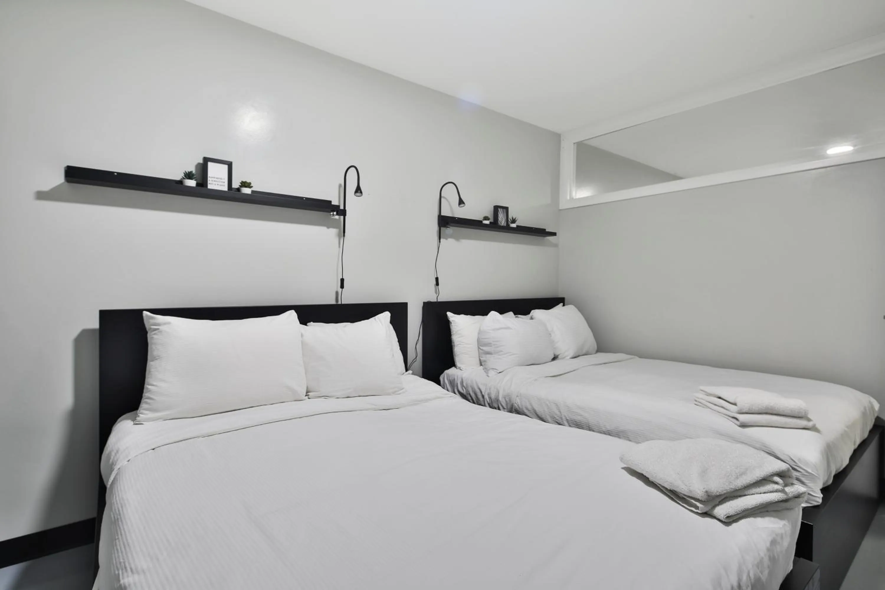 Bed in Parc Avenue Lofts