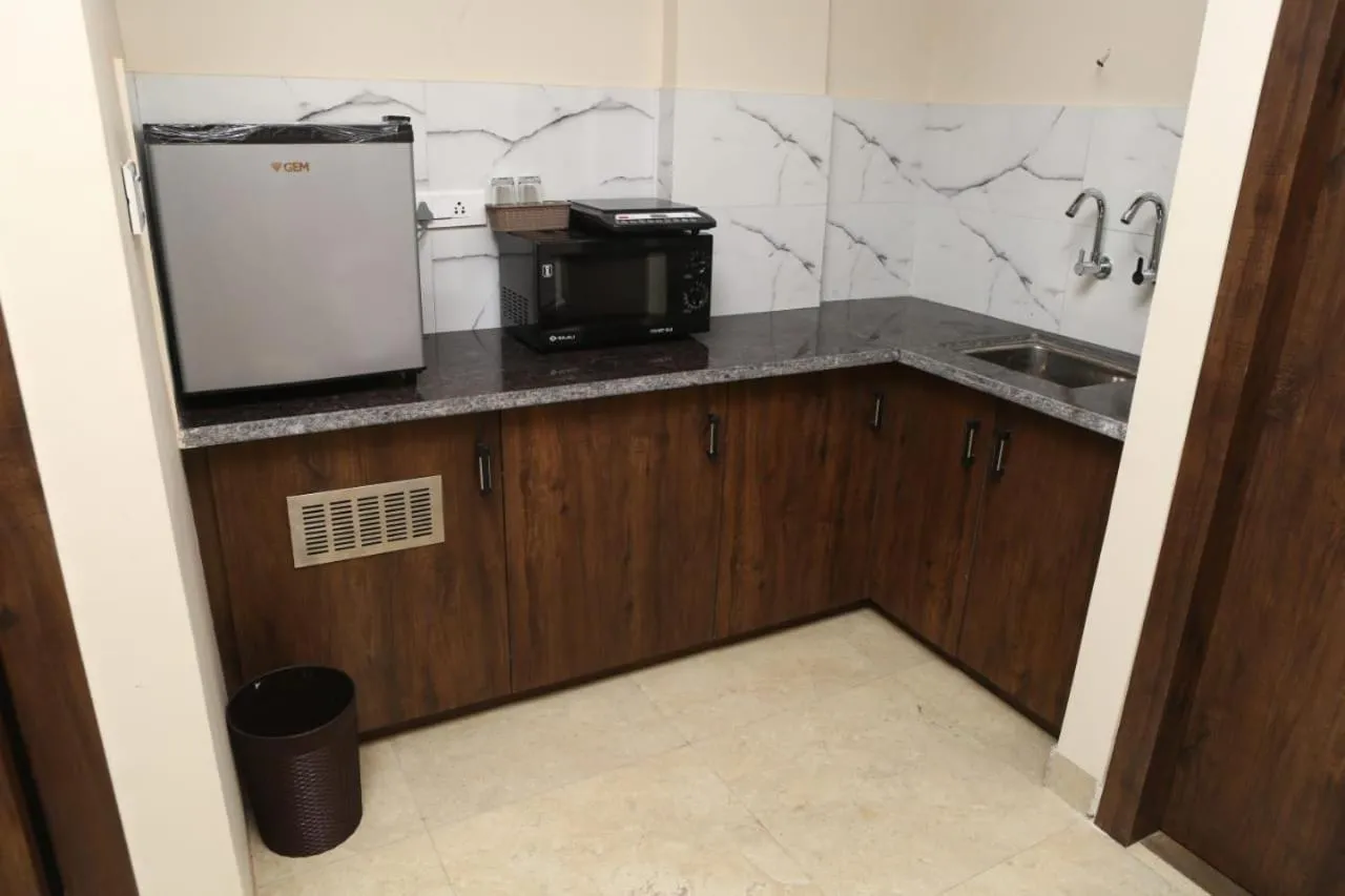 Kitchen or kitchenette in Hotel Manbhavan