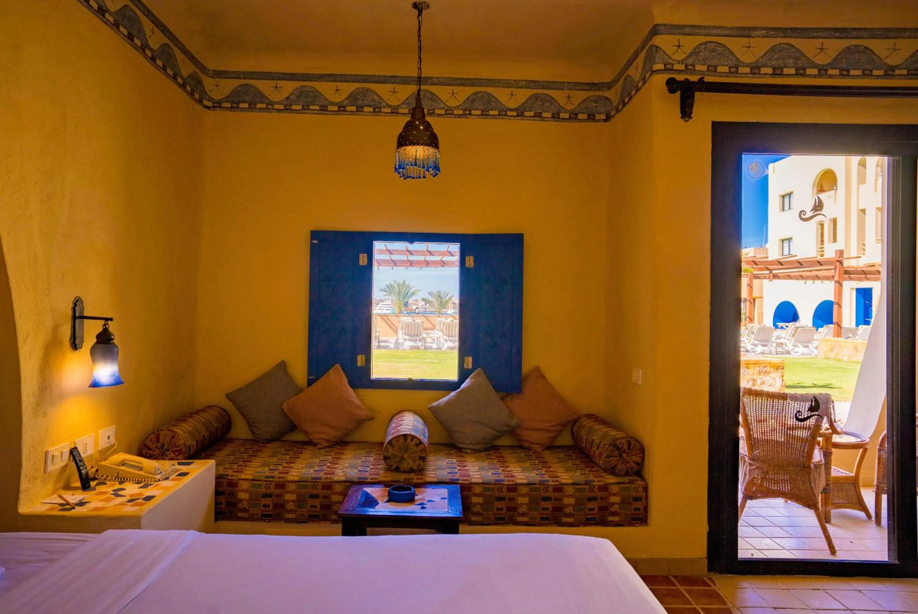 Seating area, Bed in Marina Lodge at Port Ghalib