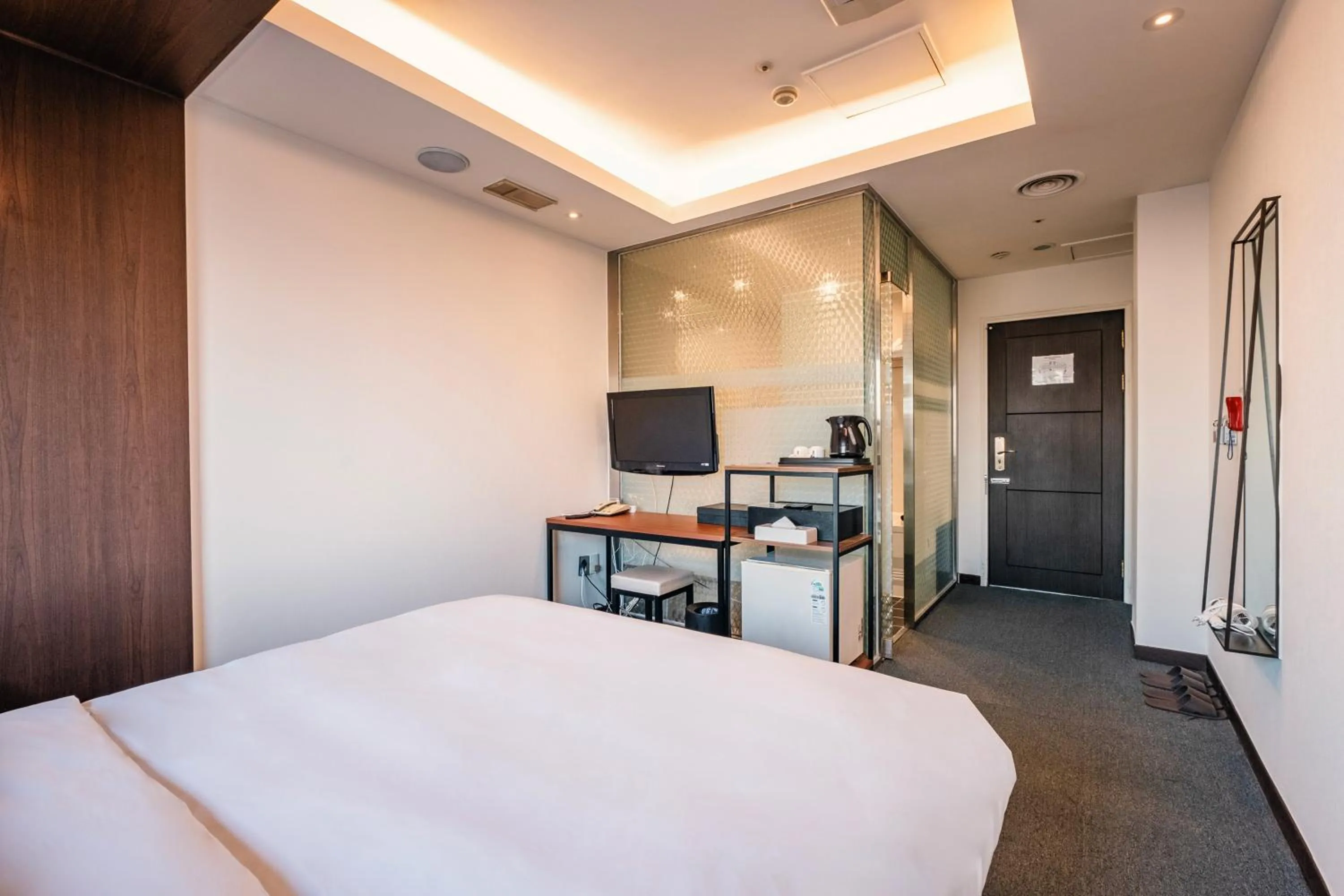 Bed in The Riverside Hotel