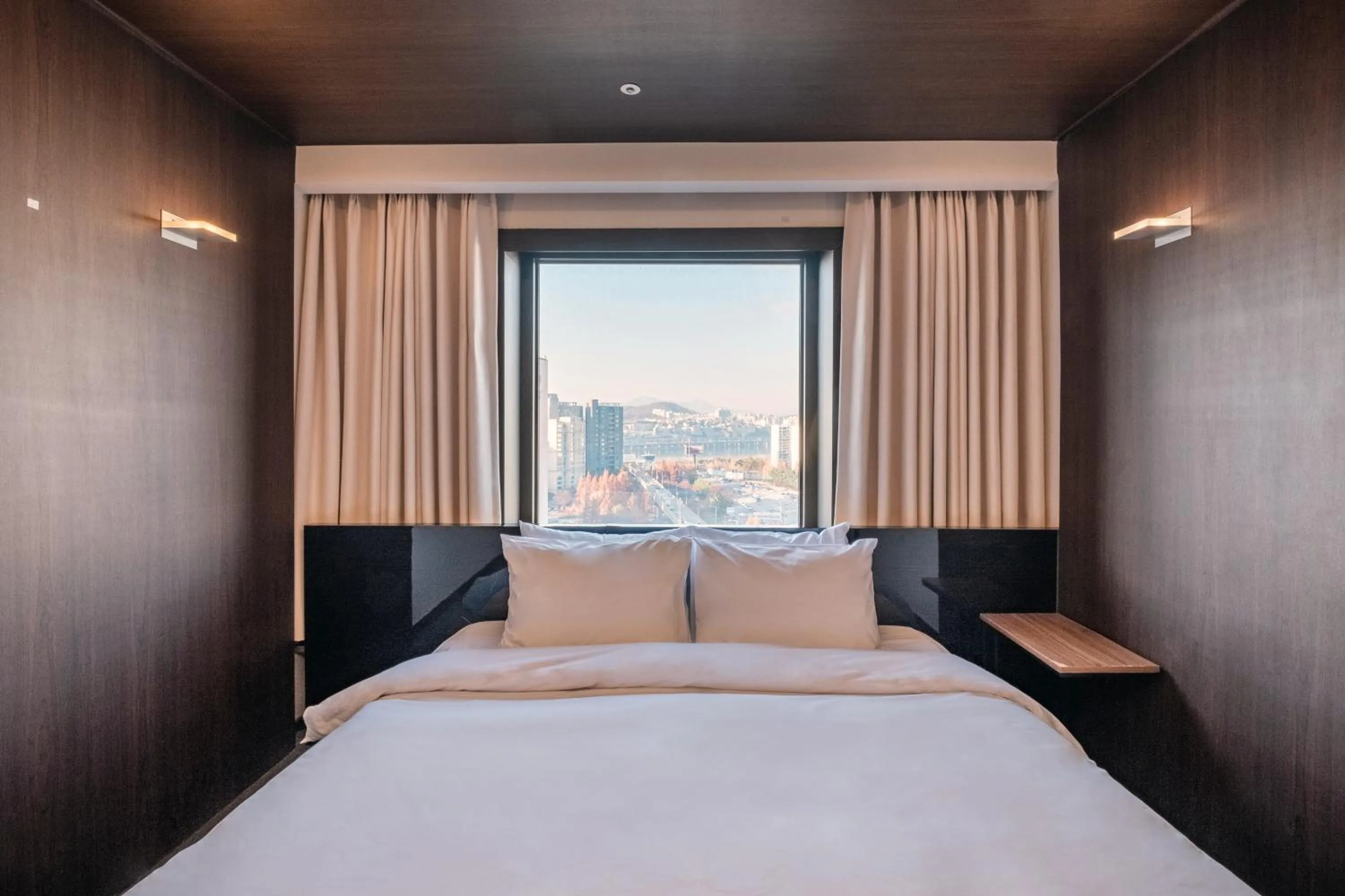 Bed in The Riverside Hotel