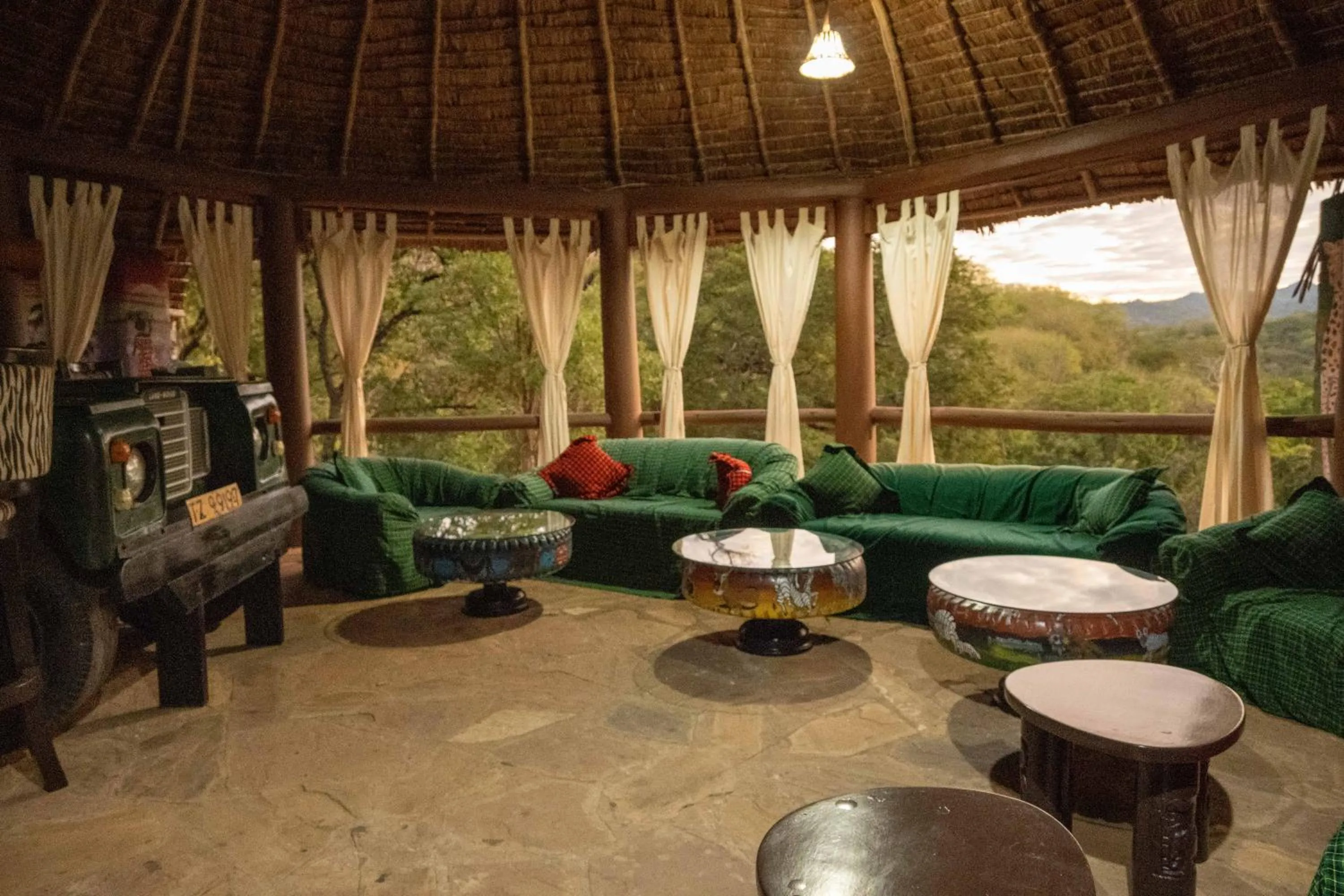 Lounge or bar in Sable Mountain Lodge, A Tent with a View Safaris
