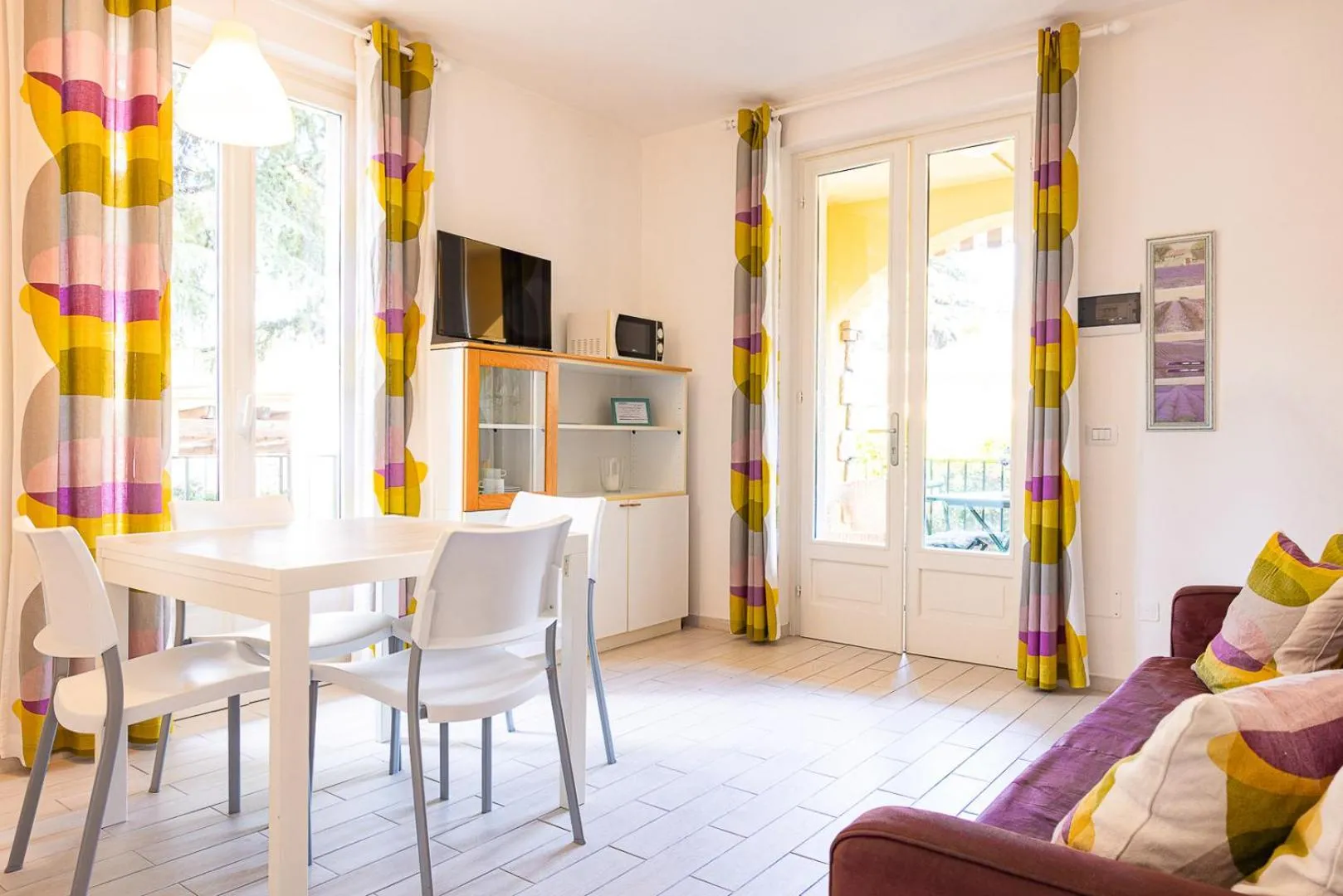 Communal lounge/ TV room in Residenza Le Logge