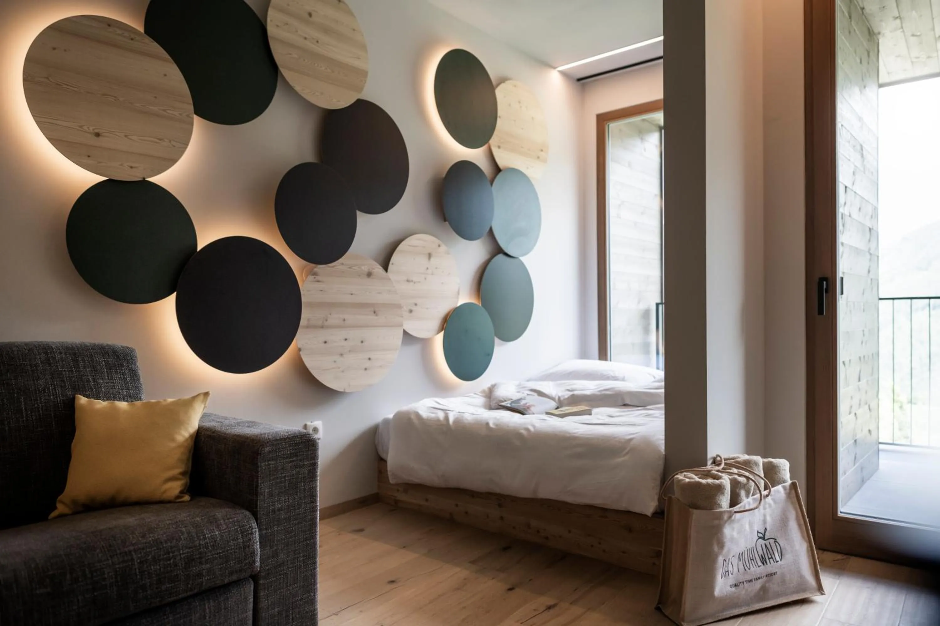 Living room, Bed in Das Mühlwald - Quality Time Family Resort