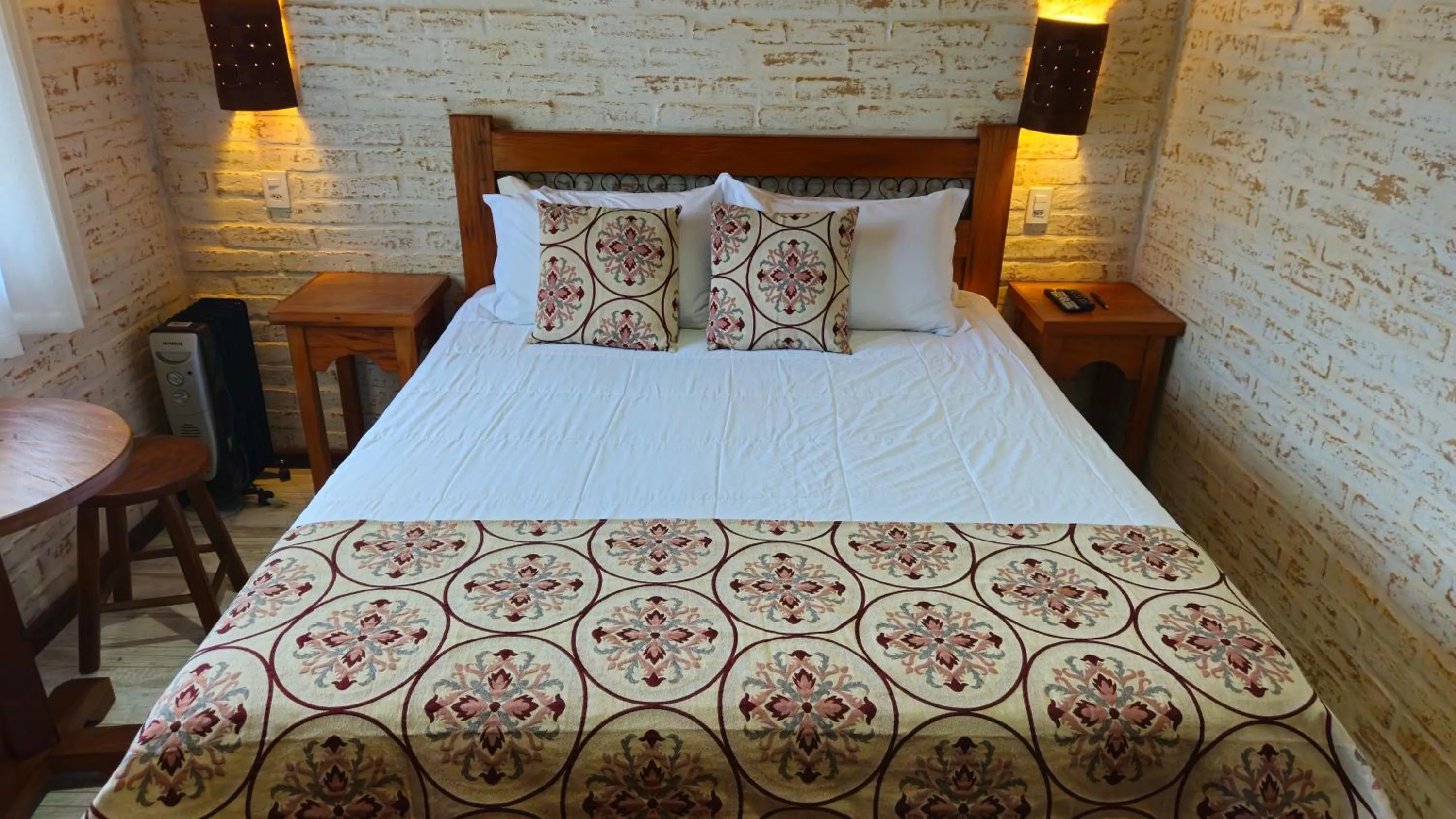 Bed in Chalé Gosto da Roça