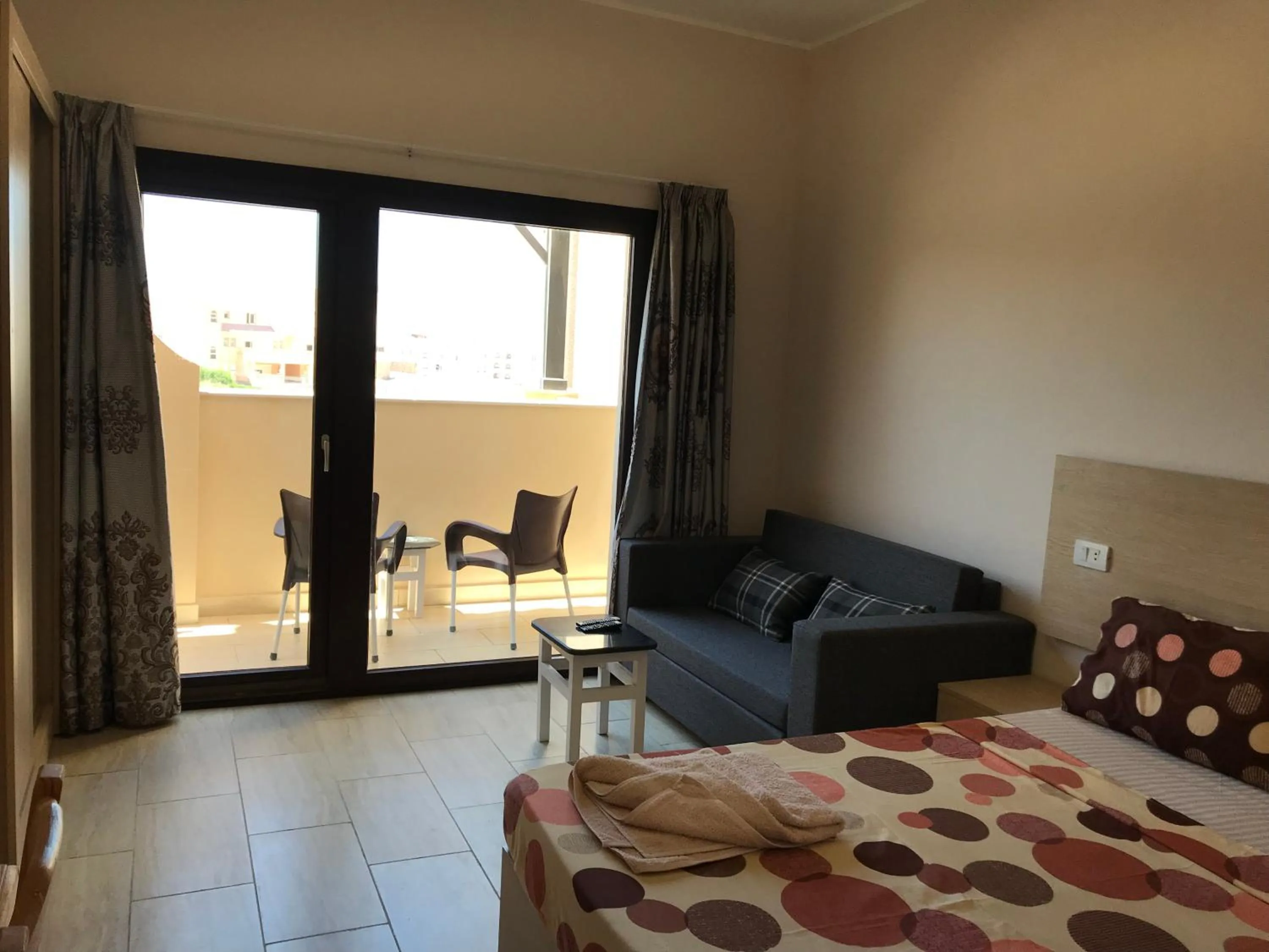 Balcony/Terrace, Bed in AlDau Heights Apartments