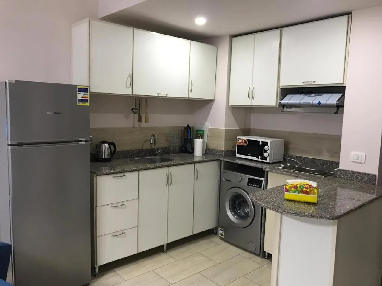 Kitchen or kitchenette in AlDau Heights Apartments