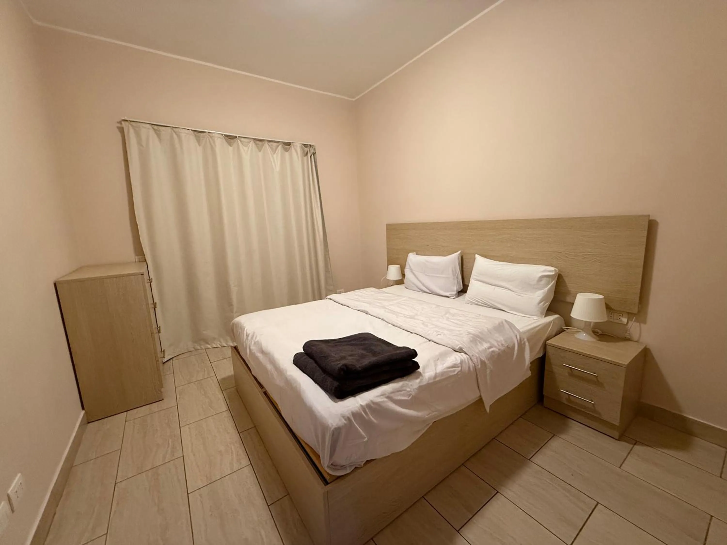 Bed in AlDau Heights Apartments