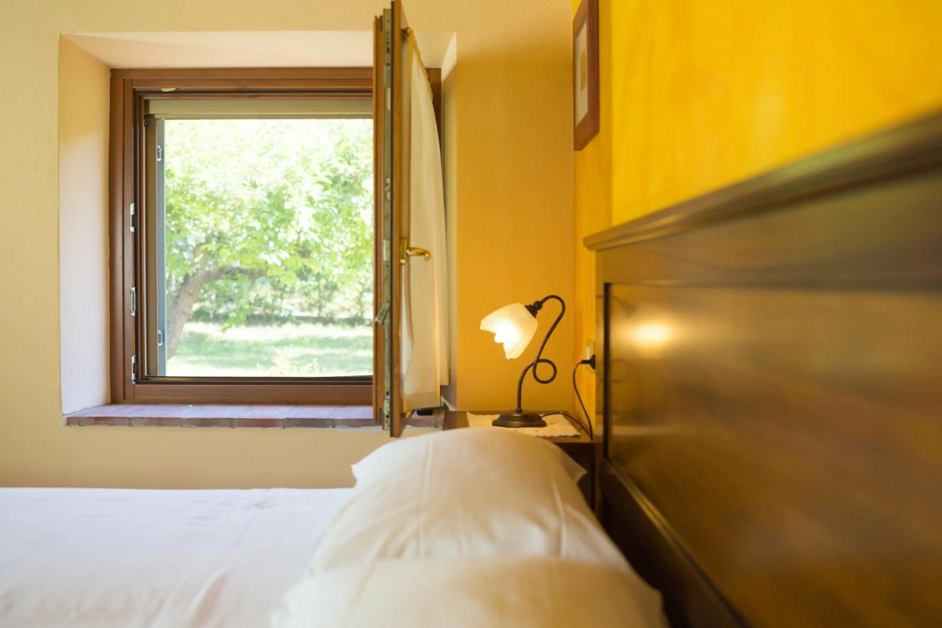 Decorative detail, Bed in Agriturismo Casa Rosa