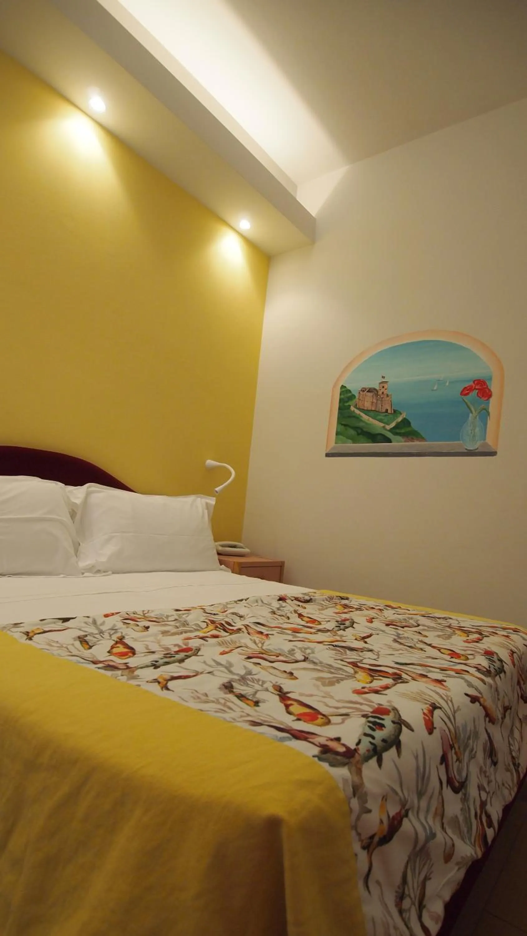 Bed in Piccolo Hotel