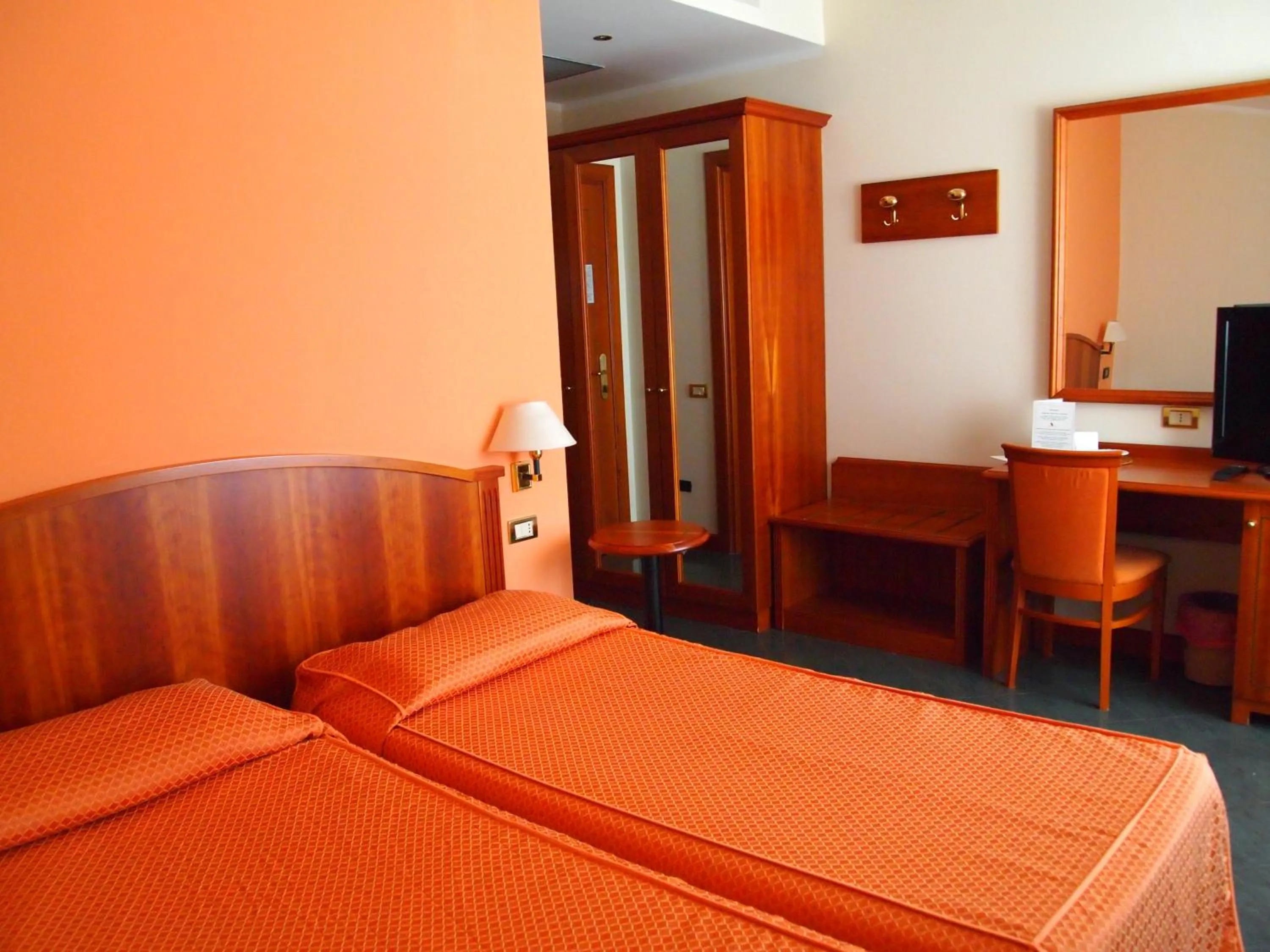 Bed in Piccolo Hotel