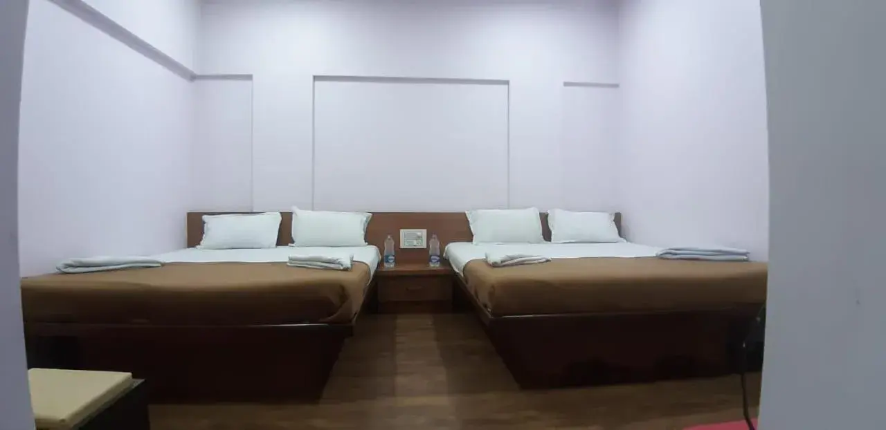 Bed in Rajhuns Deluxe Lodging Bed in Rajhuns Deluxe Lodging