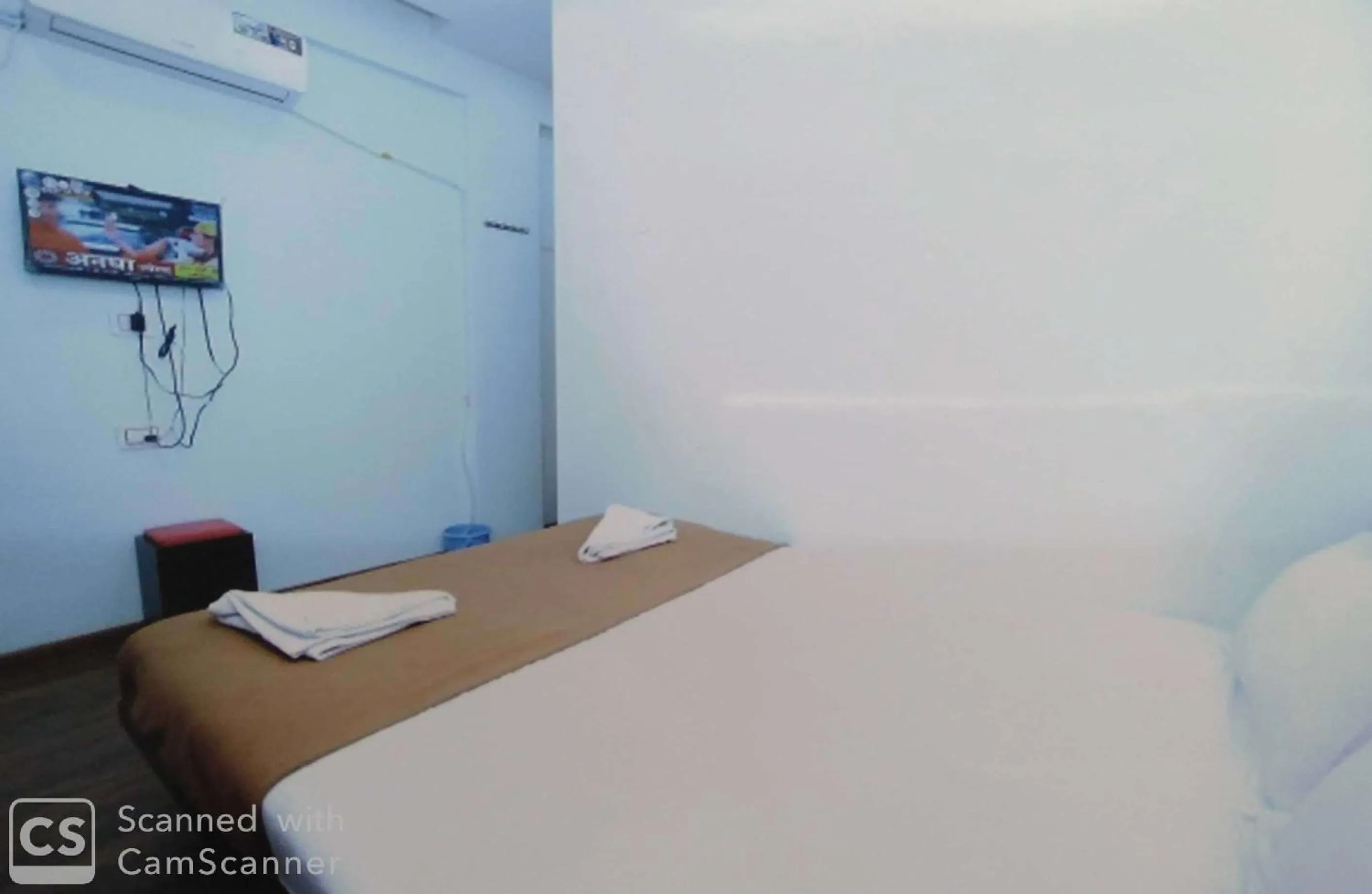 Bed in Rajhuns Deluxe Lodging