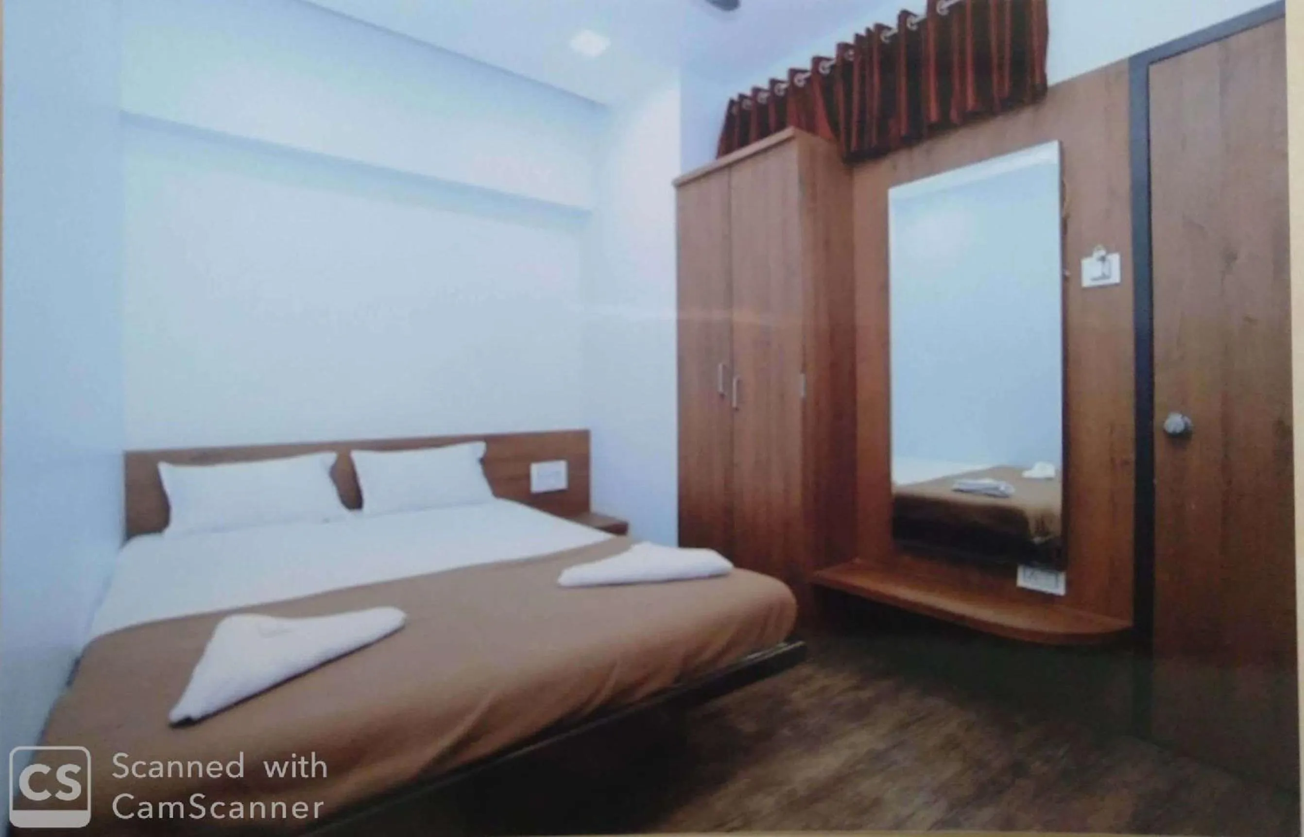 Bed in Rajhuns Deluxe Lodging