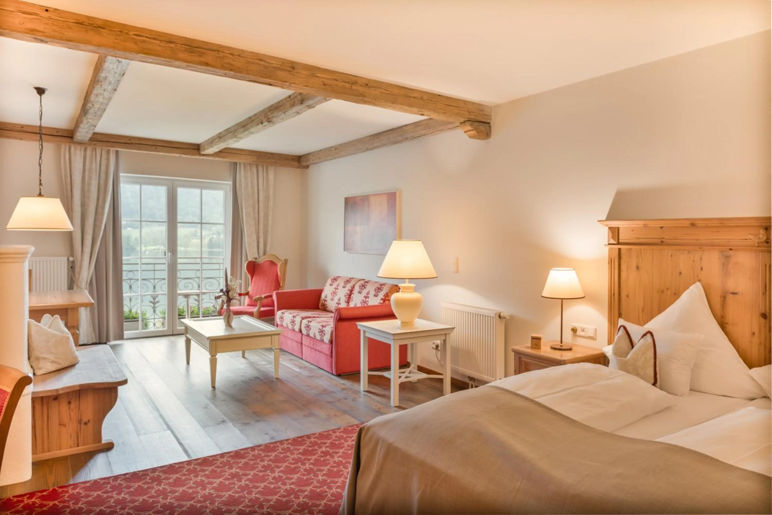 Photo of the whole room, Bed in Waldhof Fuschlsee Resort