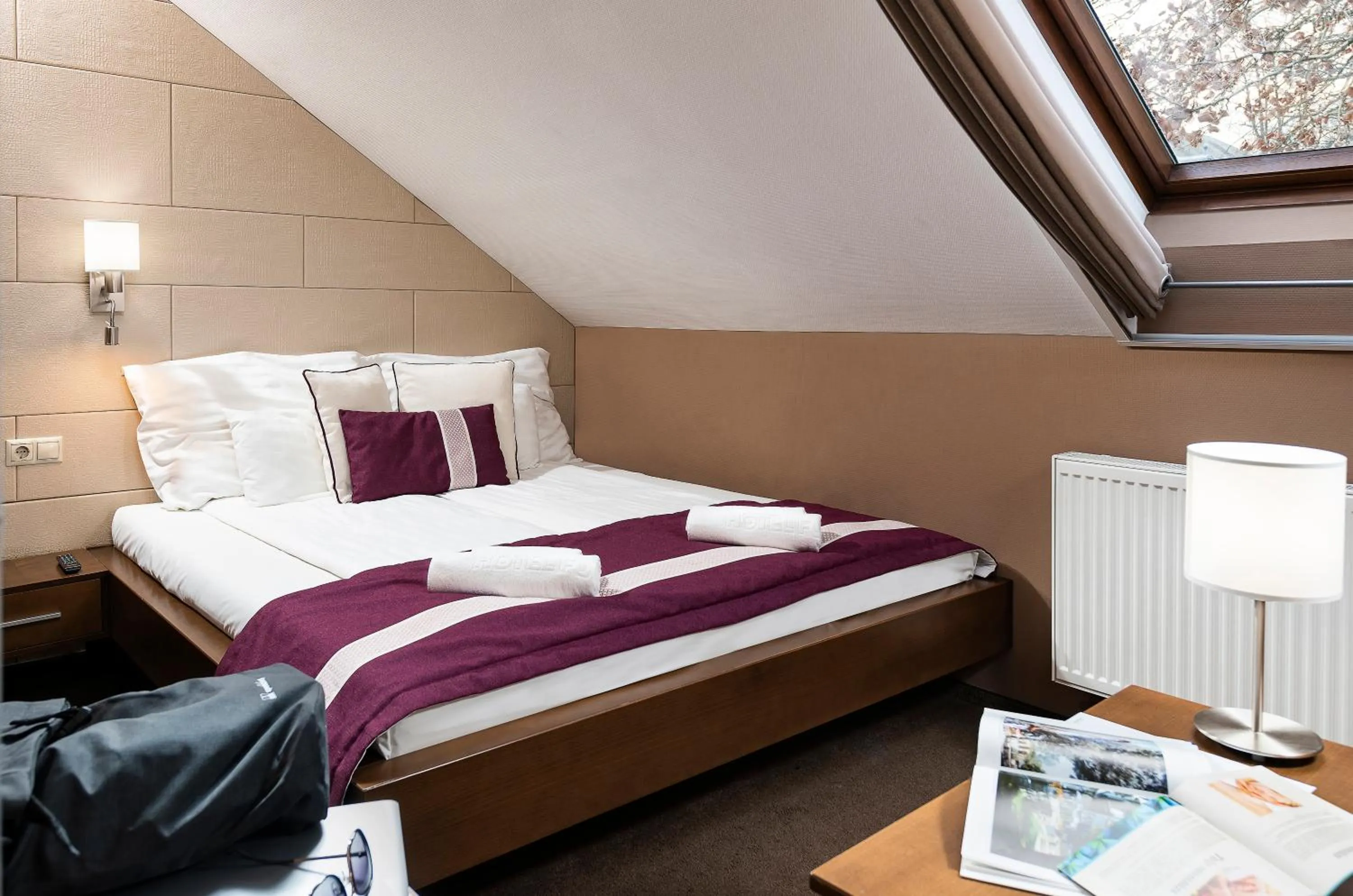 Bed in Hotel Fürdőház