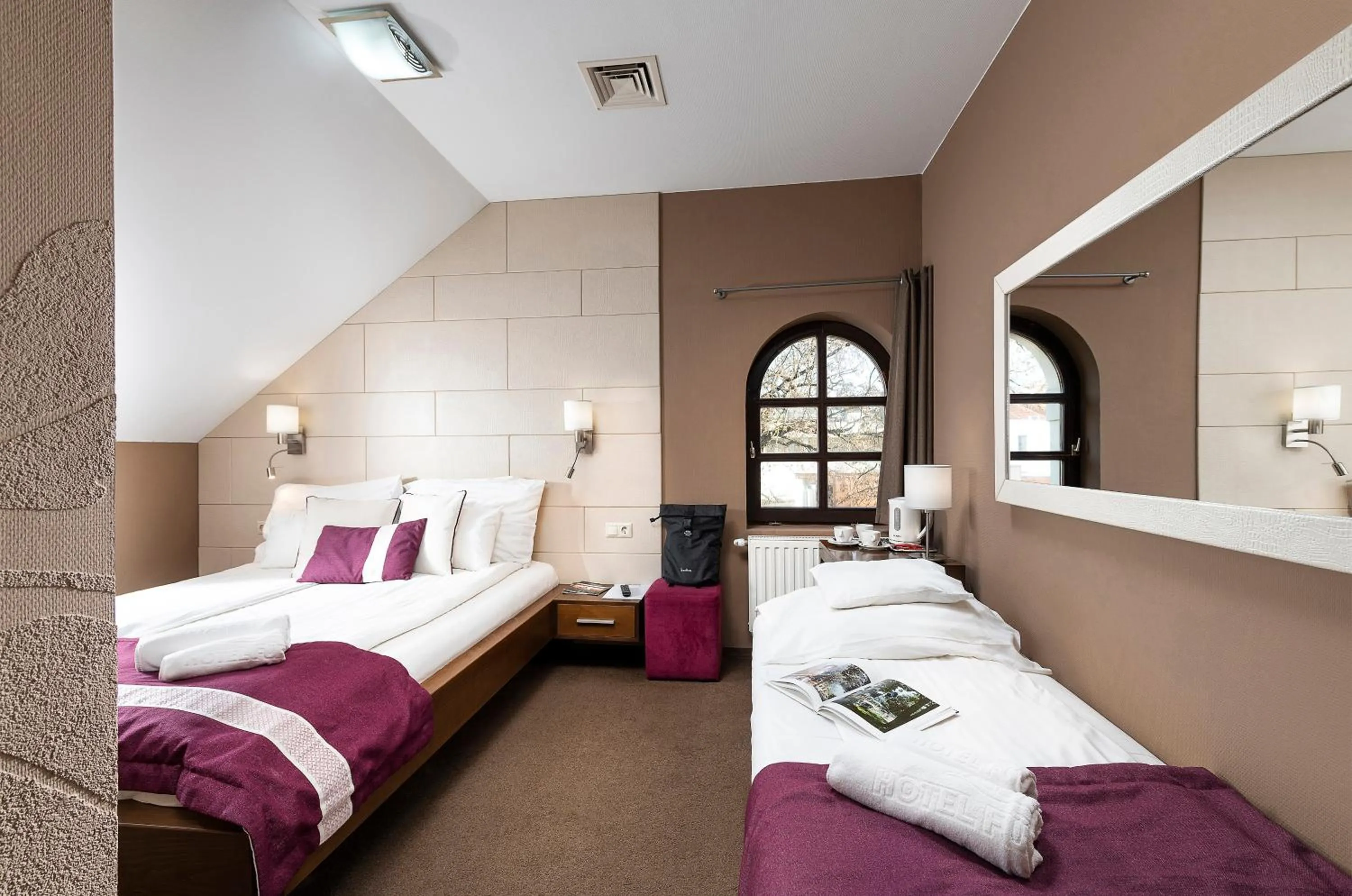 Bed in Hotel Fürdőház