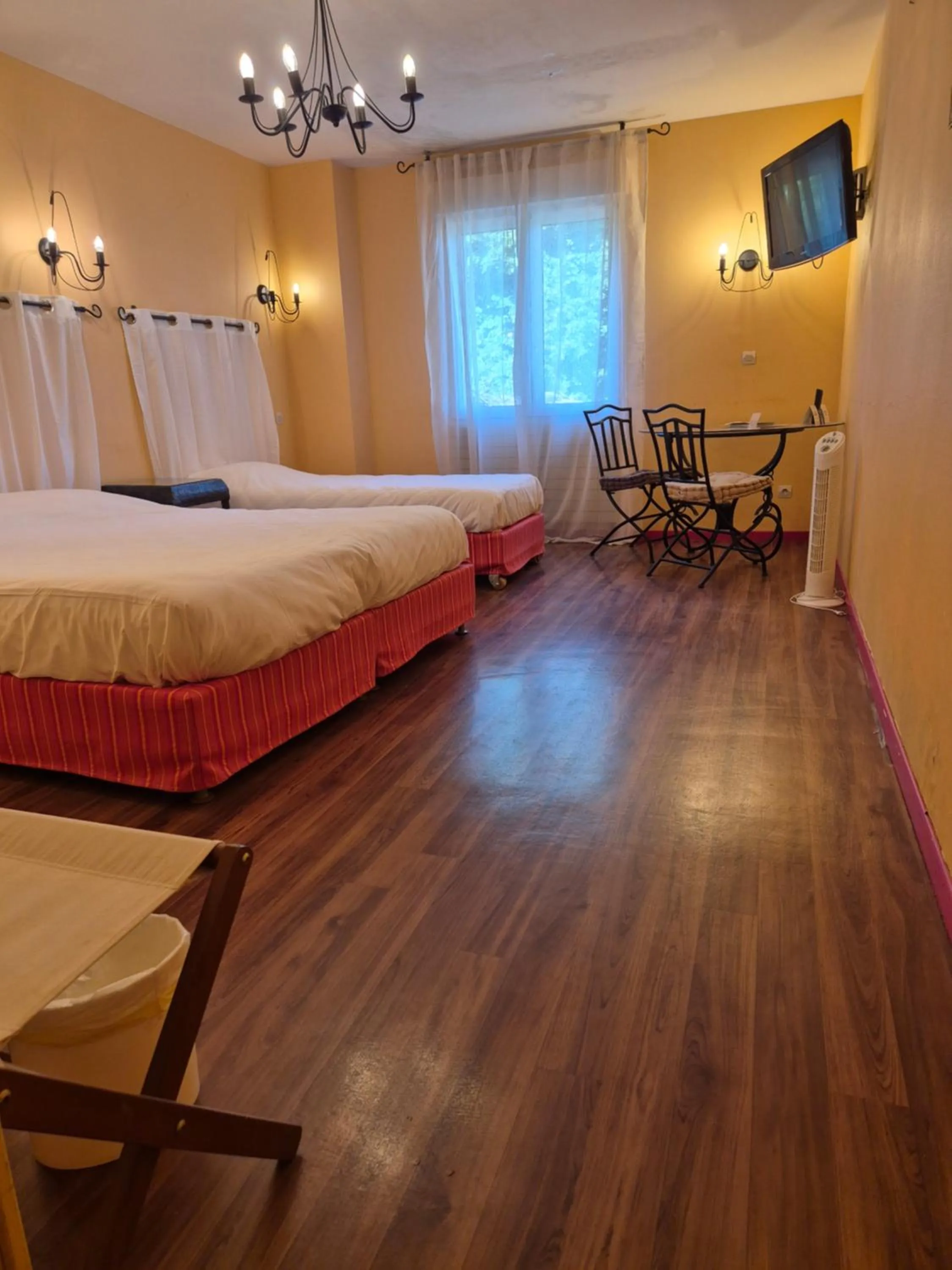 Photo of the whole room, Bed in Logis Hôtel Restaurant Les Norias