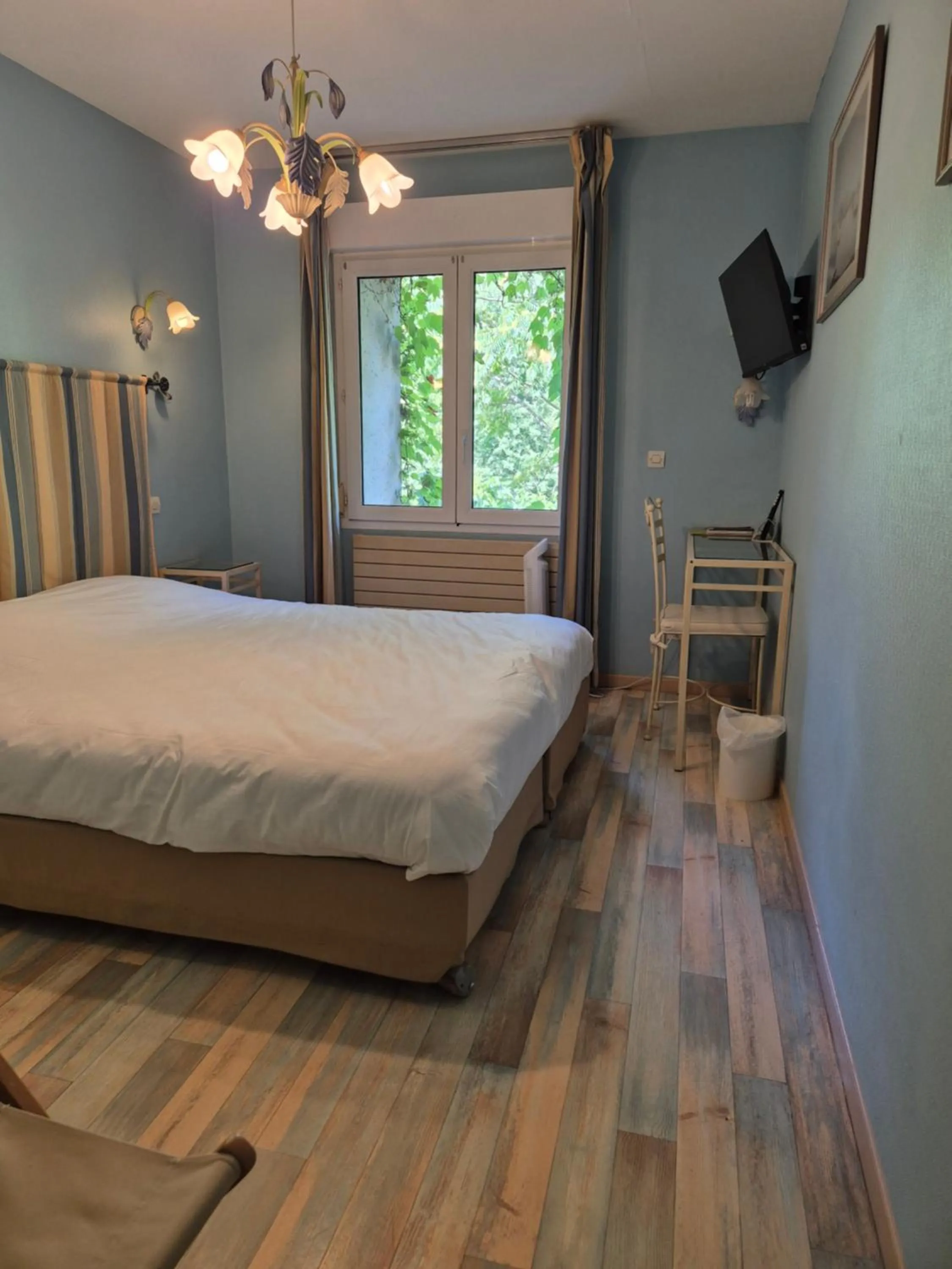 Photo of the whole room, Bed in Logis Hôtel Restaurant Les Norias