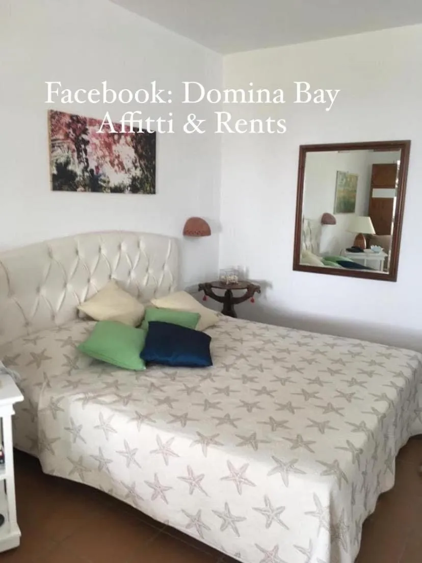 Bed in One-Bedroom Apartment at Domina Coral Bay