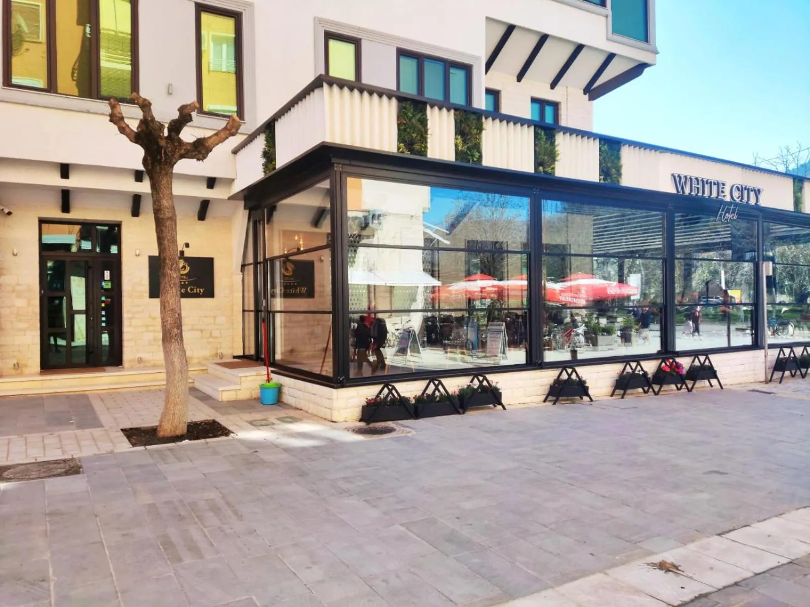 Property building in Hotel & Restaurant White City