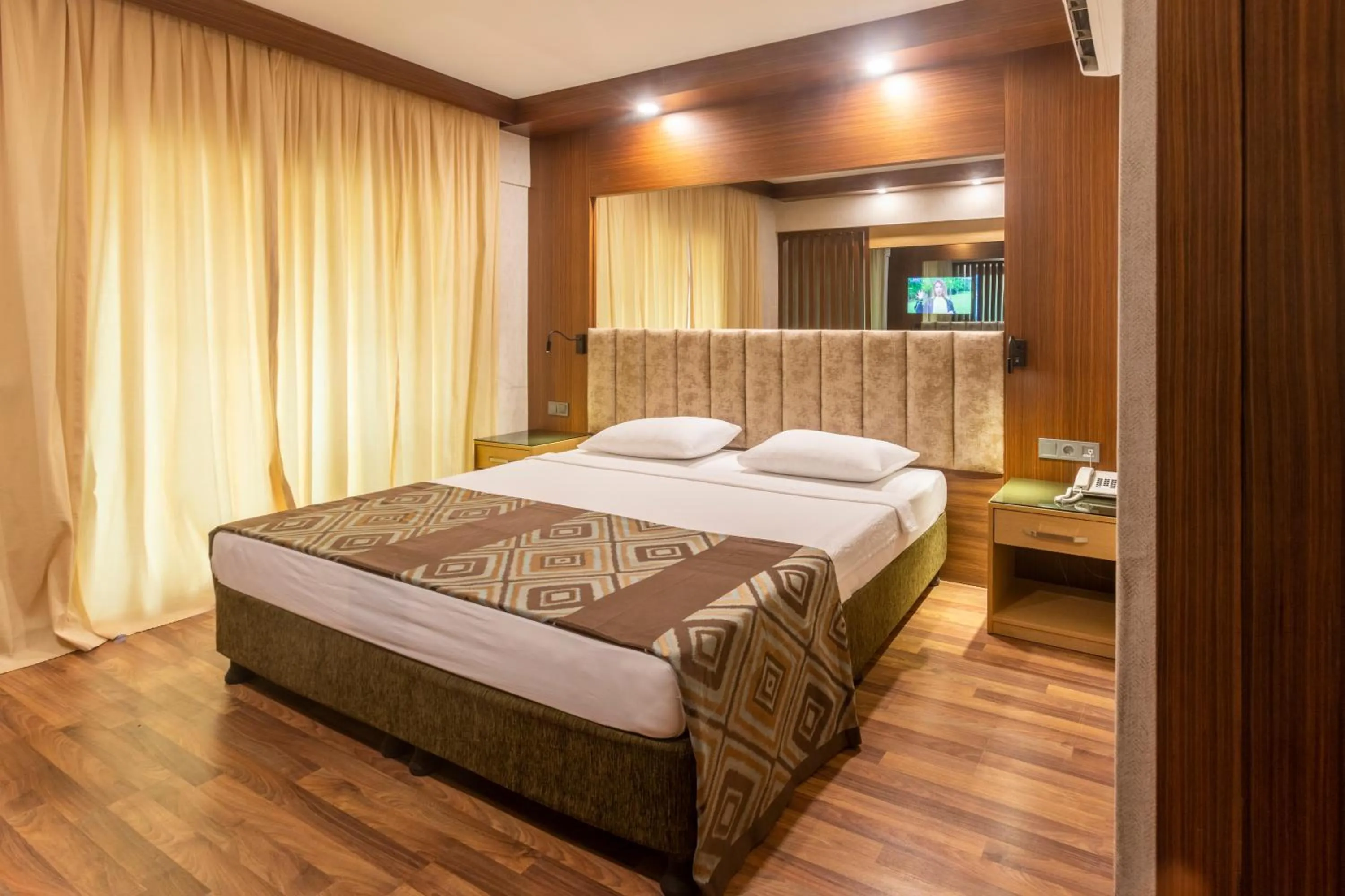 Bed in Fame Beach Hotel