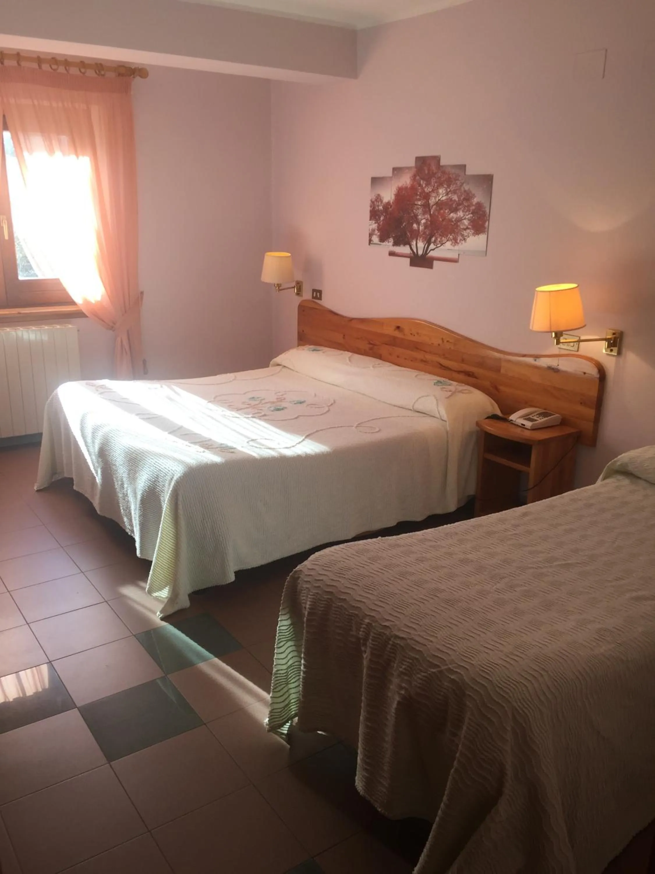 Bed in hotel lo sciatore