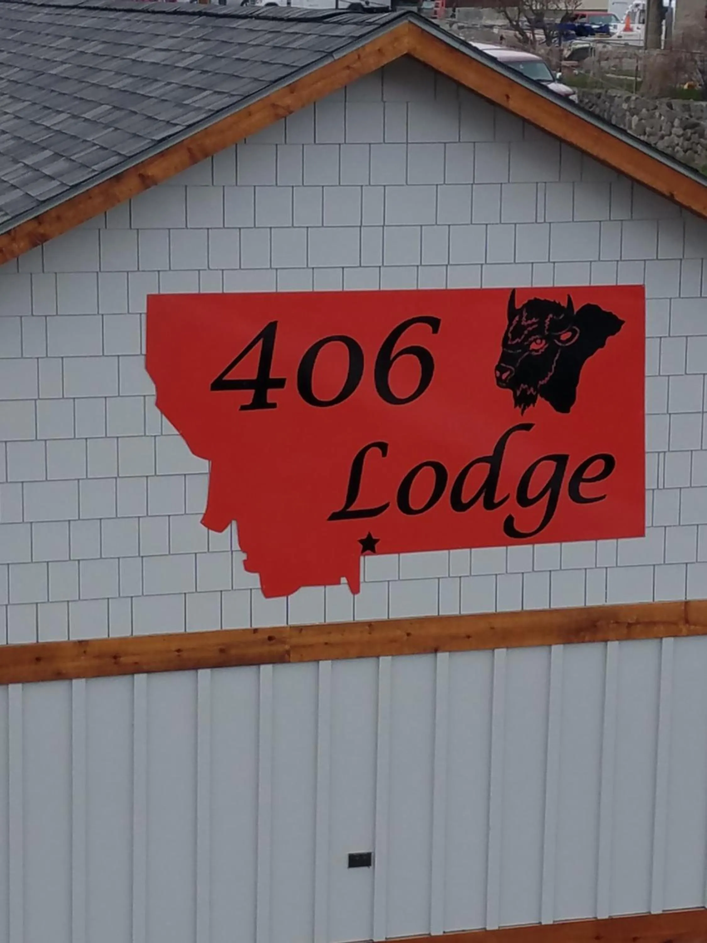 Property logo or sign in 406 Lodge at Yellowstone