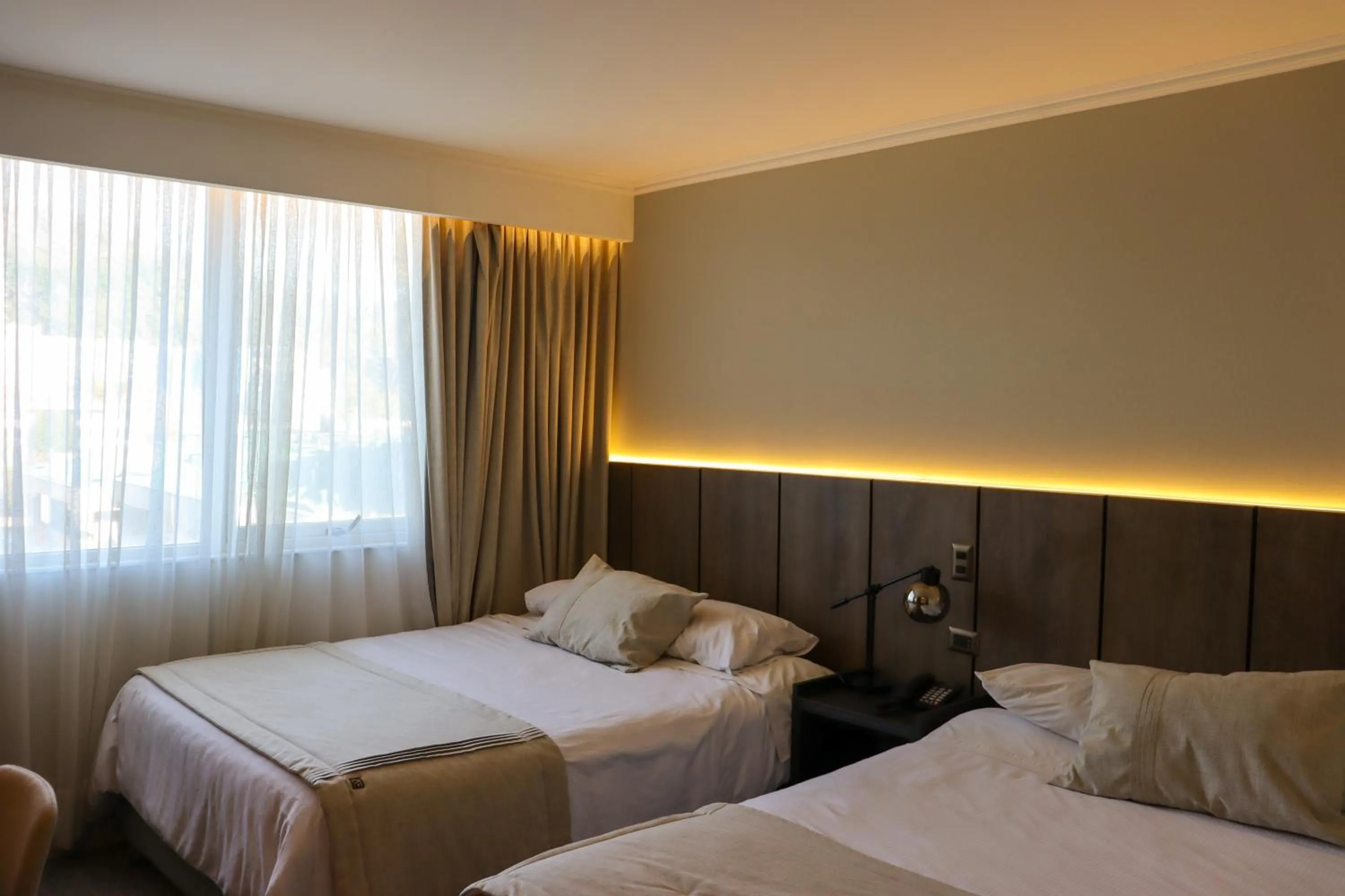 Photo of the whole room, Bed in Hotel Terrano Concepción