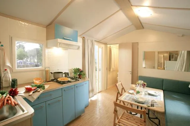 Kitchen or kitchenette in New Camping Le Tamerici