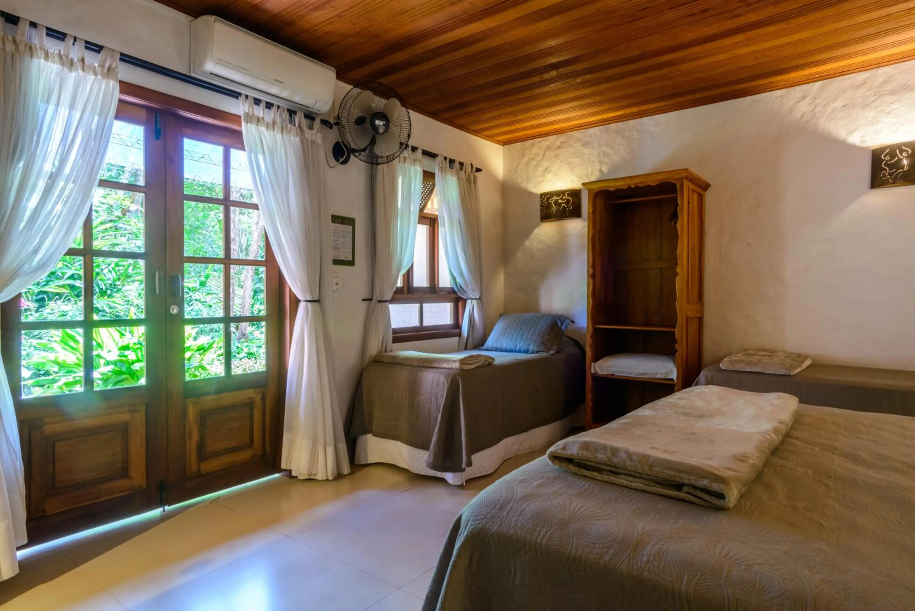 Bed in Pousada Vila Serrano