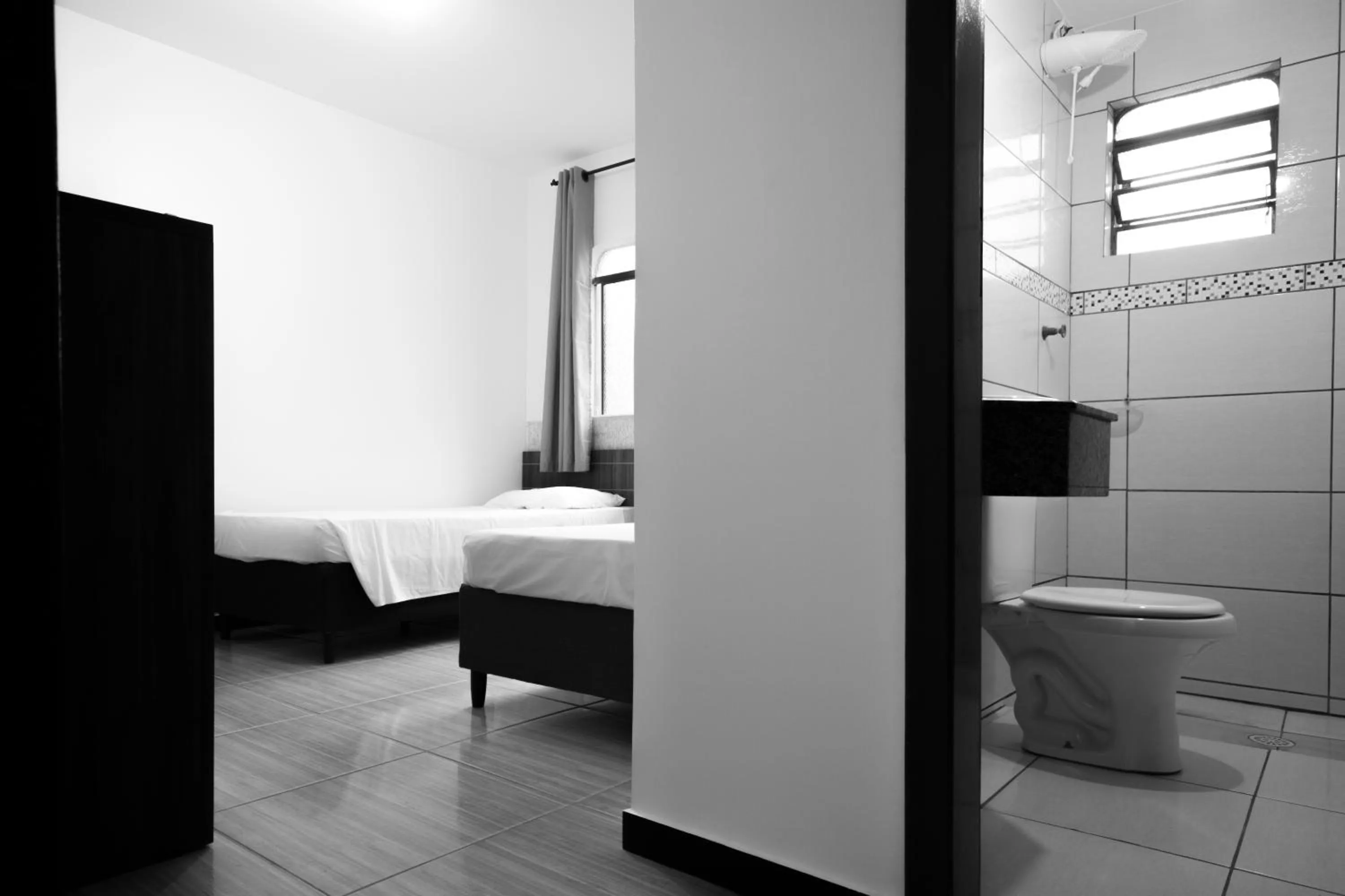 Toilet, Bed in Hotel Holiday Foz