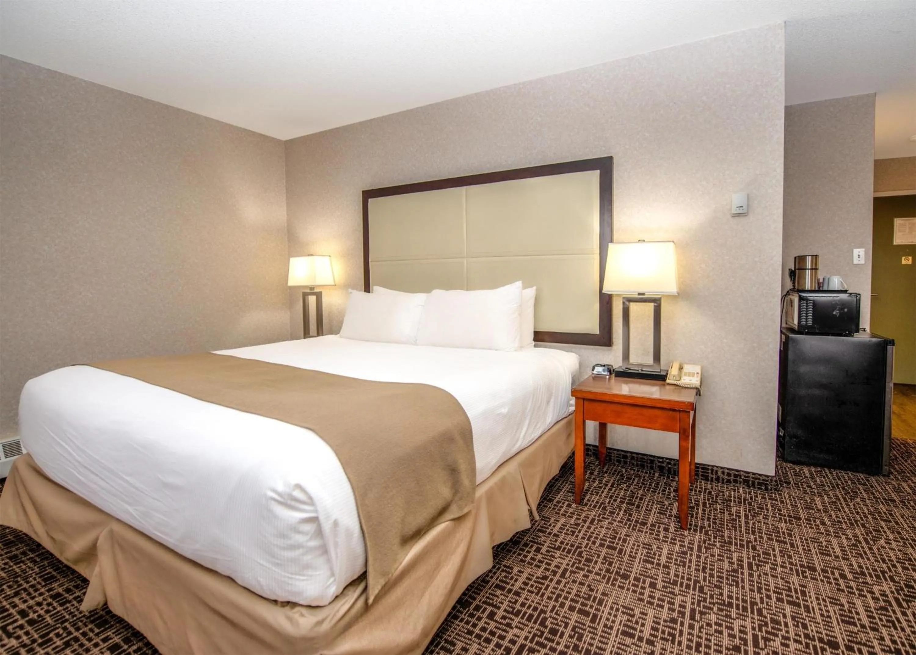 Photo of the whole room, Bed in Coast Fort St John Hotel