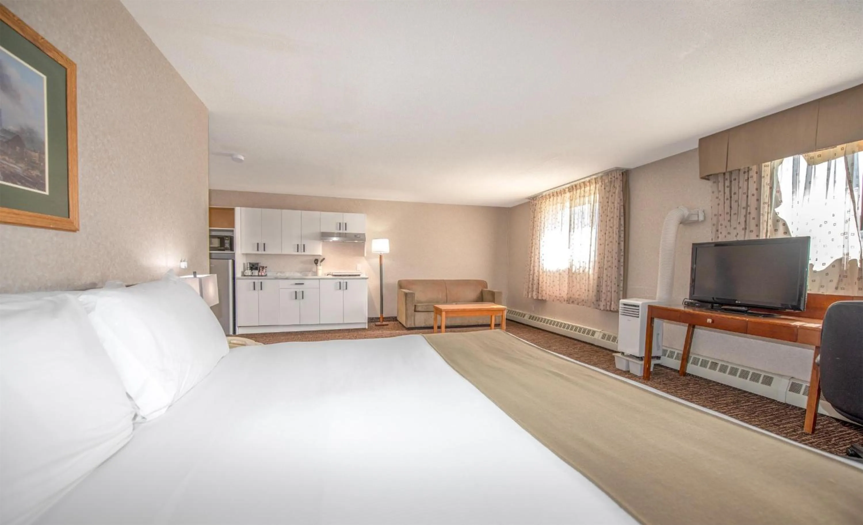 Photo of the whole room, Bed in Coast Fort St John Hotel