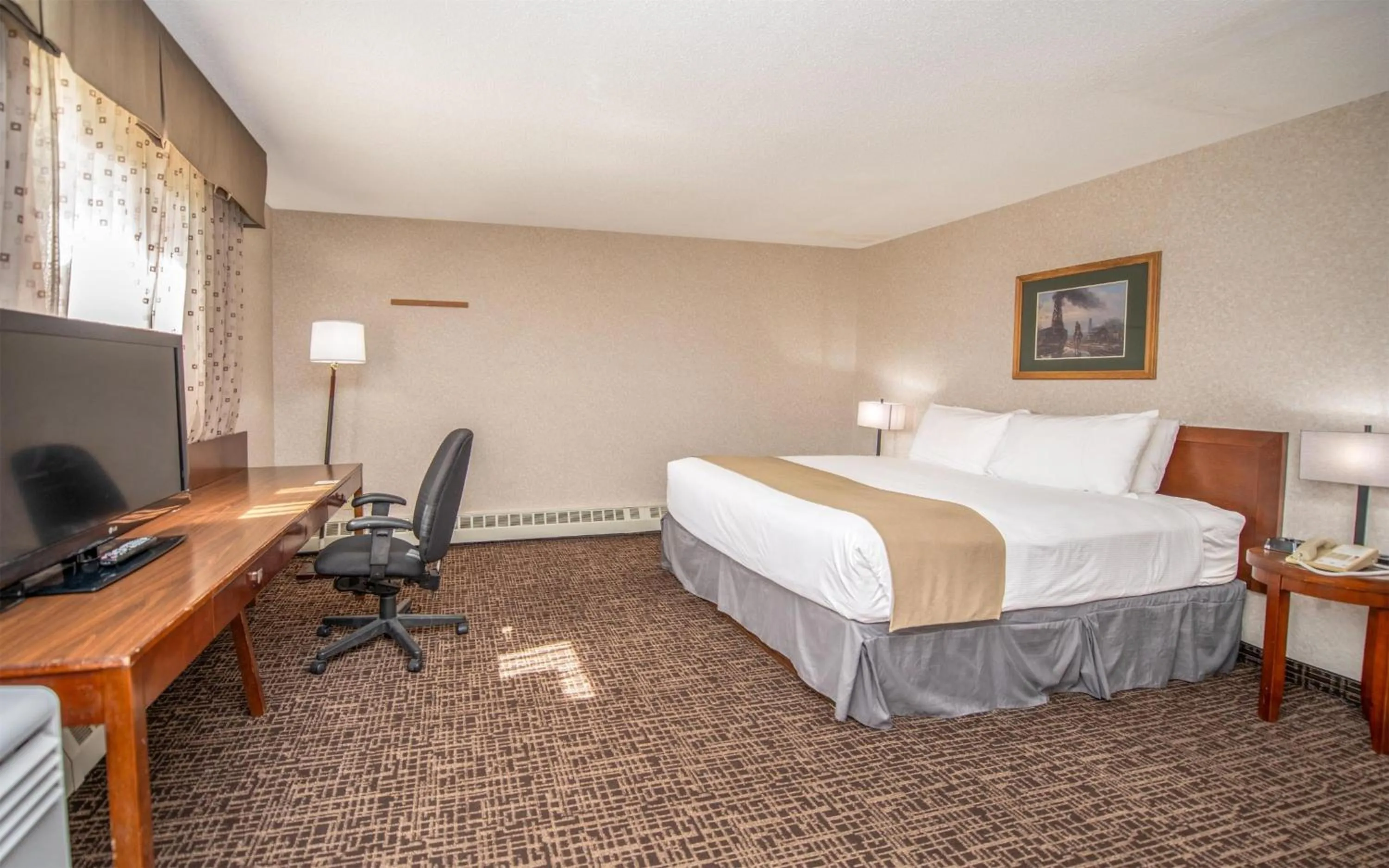 Photo of the whole room, Bed in Coast Fort St John Hotel