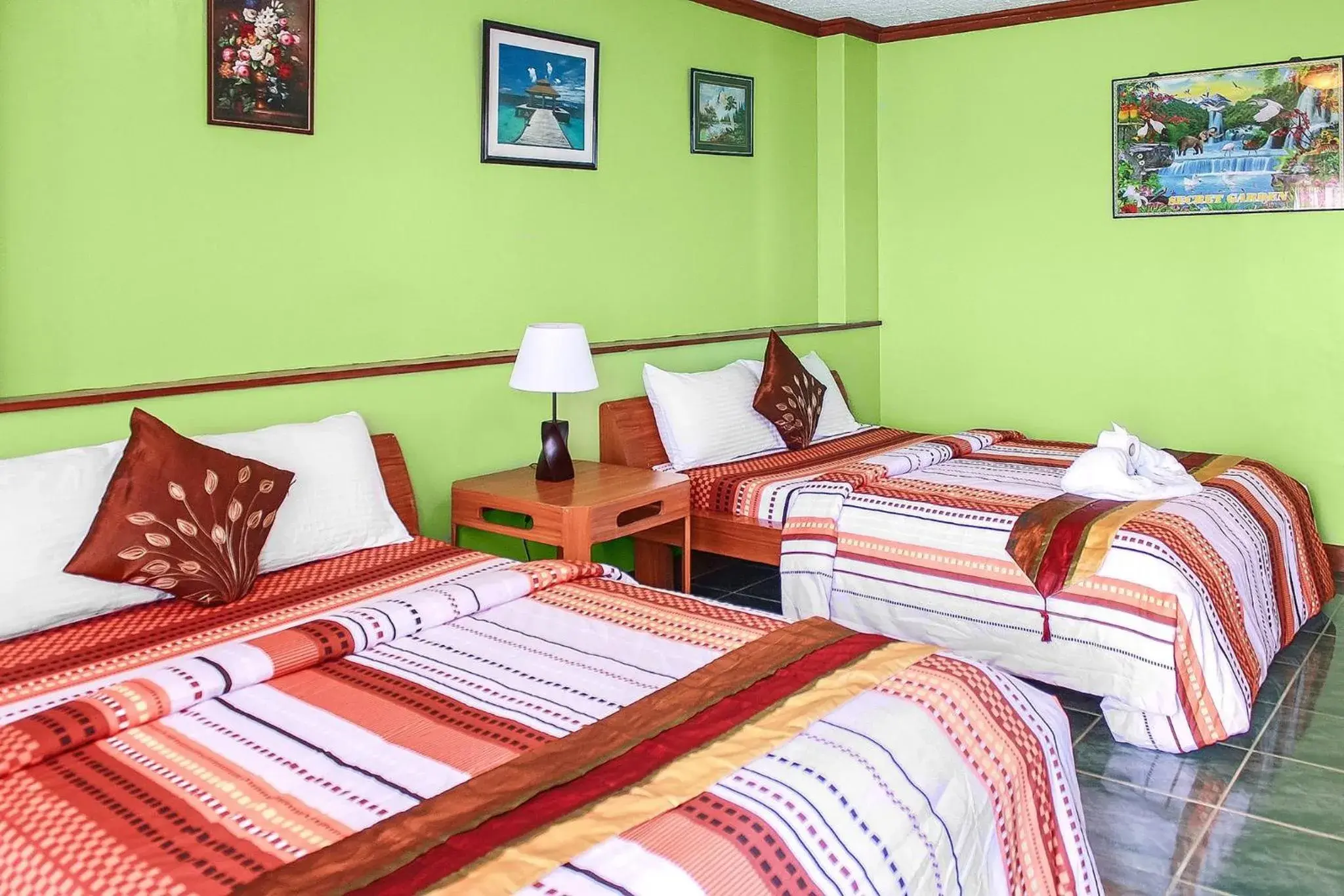 Bed in Blue Corals Beach Resort Bed in Blue Corals Beach Resort