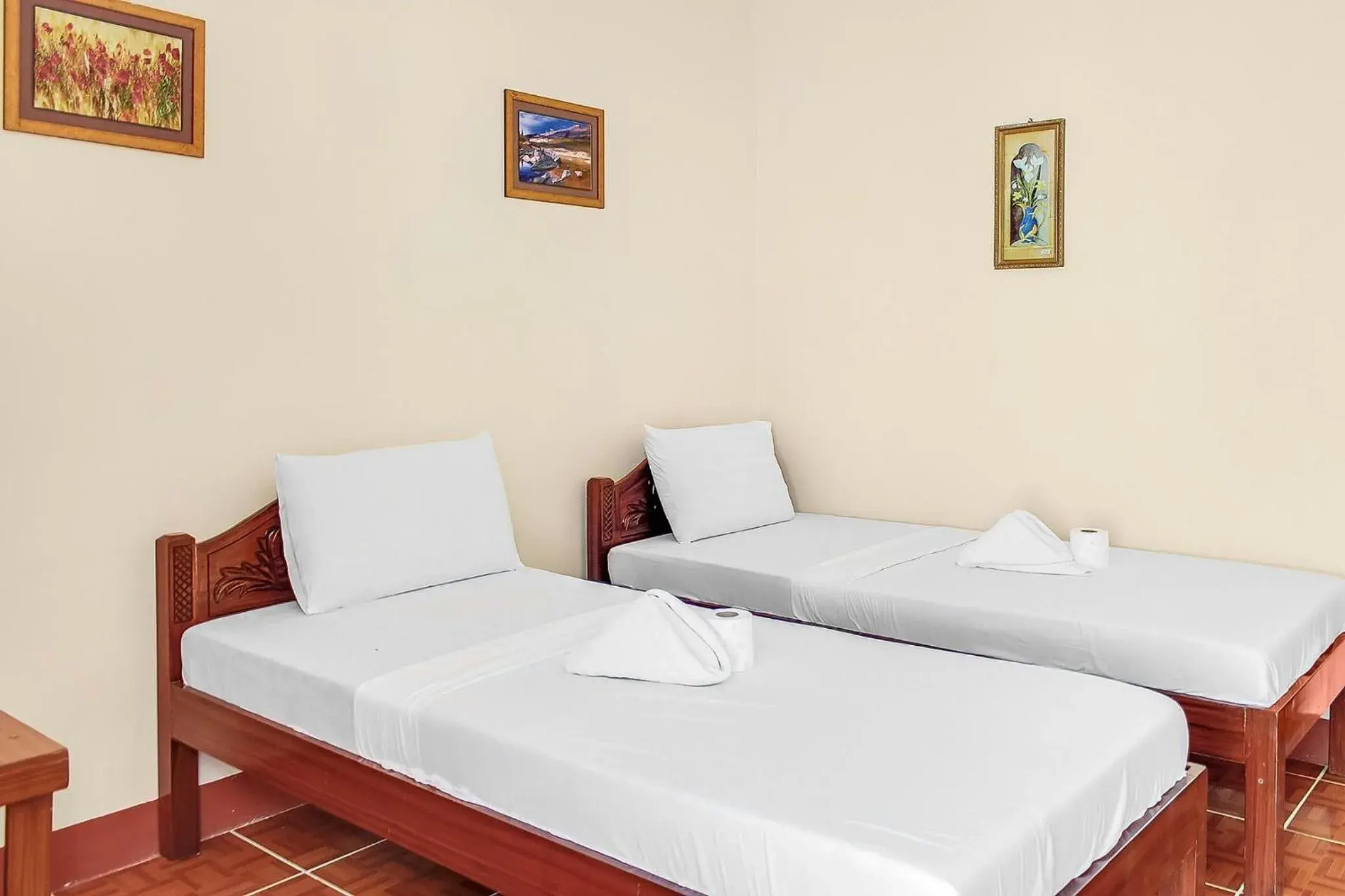 Bed in Blue Corals Beach Resort Bed in Blue Corals Beach Resort