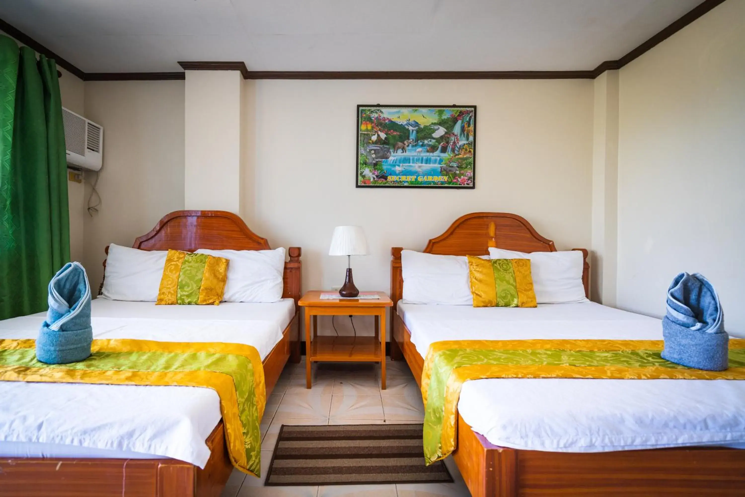 Bed in Blue Corals Beach Resort Bed in Blue Corals Beach Resort
