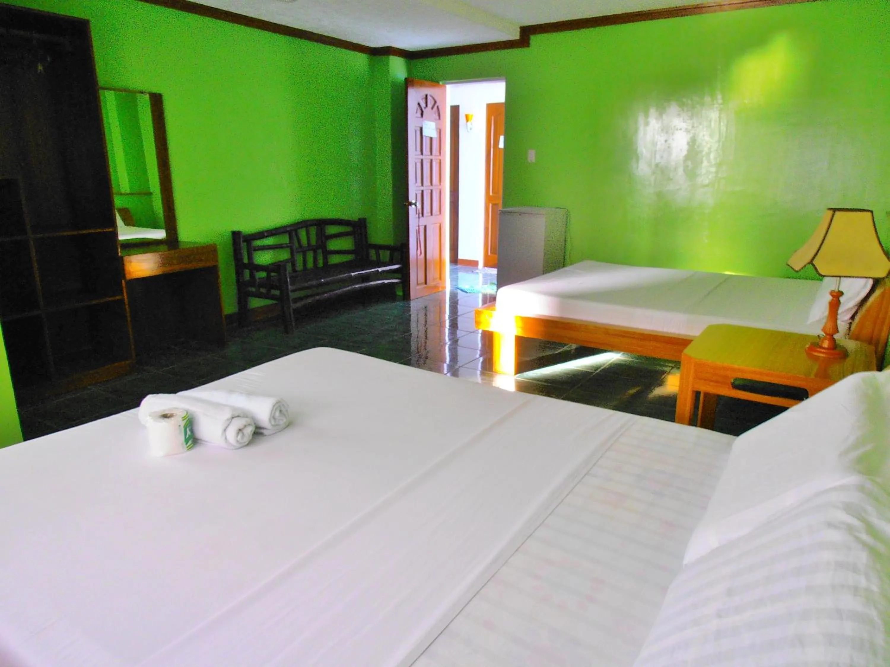 Photo of the whole room, Bed in Blue Corals Beach Resort