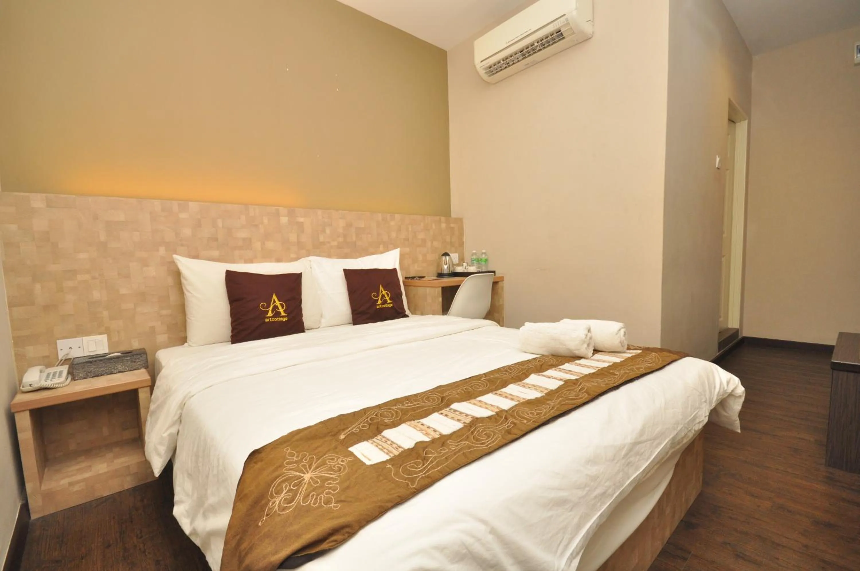 Bed in Art Cottage Hotel